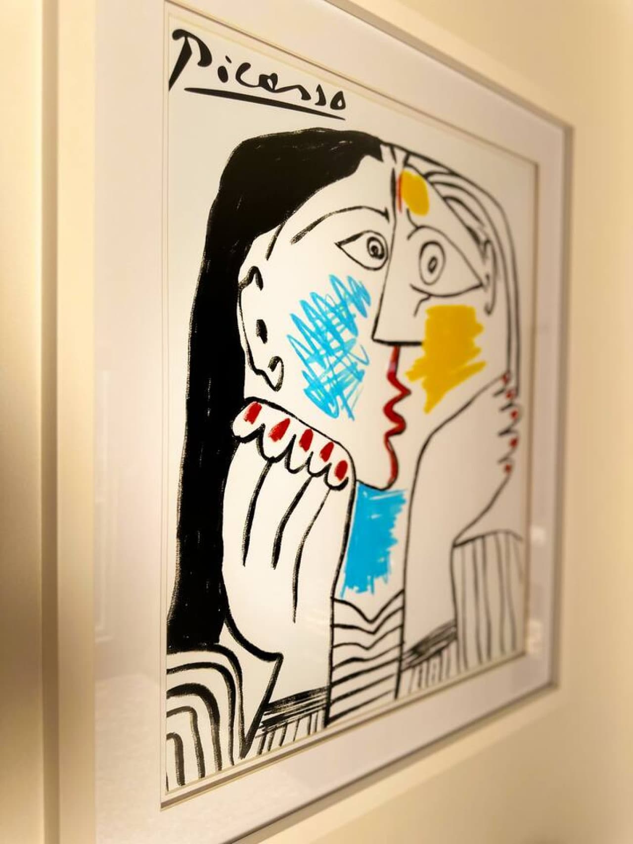 An elegant framed piece to elevate the artistic vibe in the bedroom or common area.