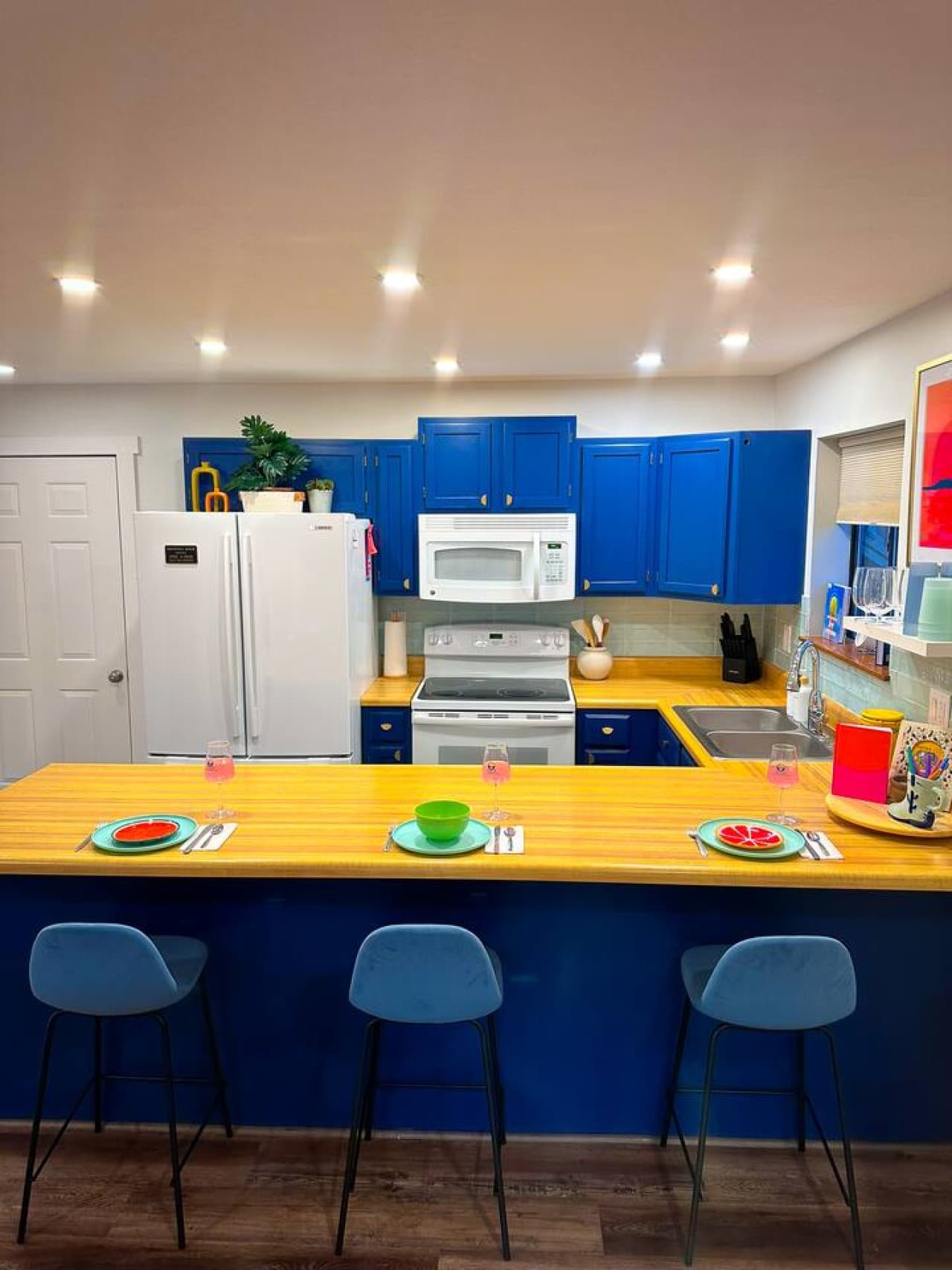 Enjoy casual dining at the breakfast bar, surrounded by stylish details and warm lighting.