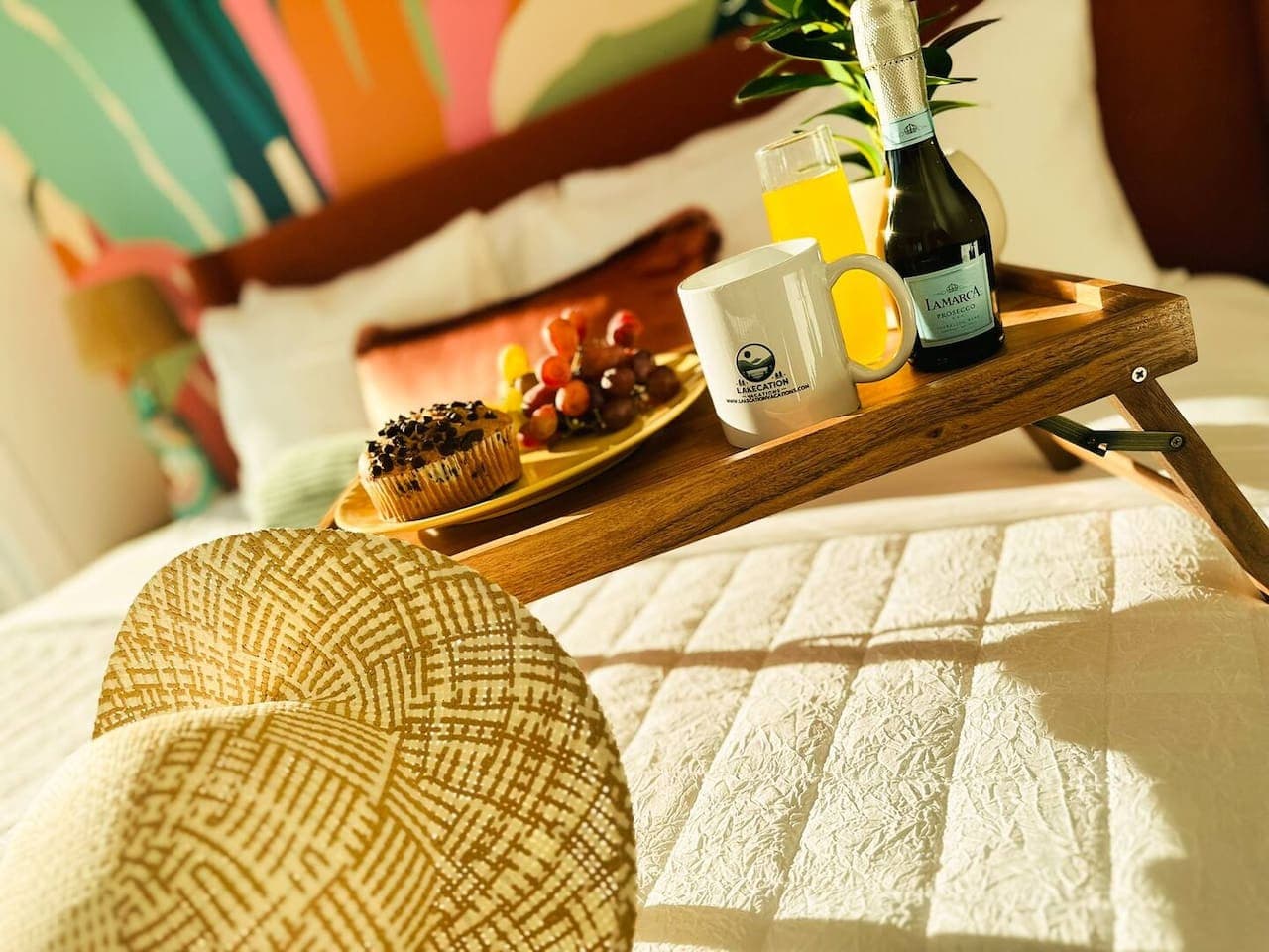 Wake up to indulgence – breakfast in bed with vibrant colors and luxurious comfort.