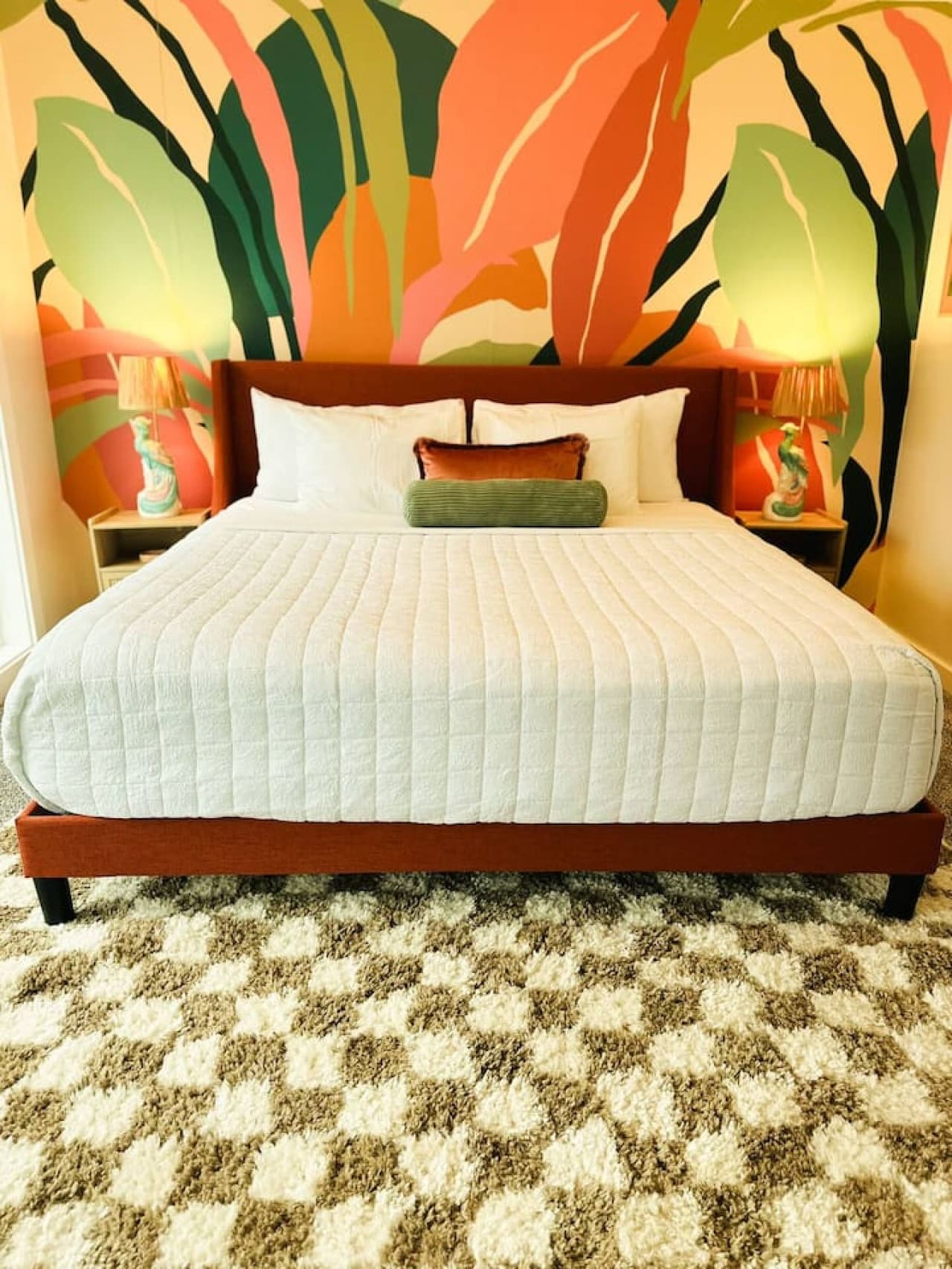 Vibrant master king bedroom decor and luxurious comfort combine for a restful retreat