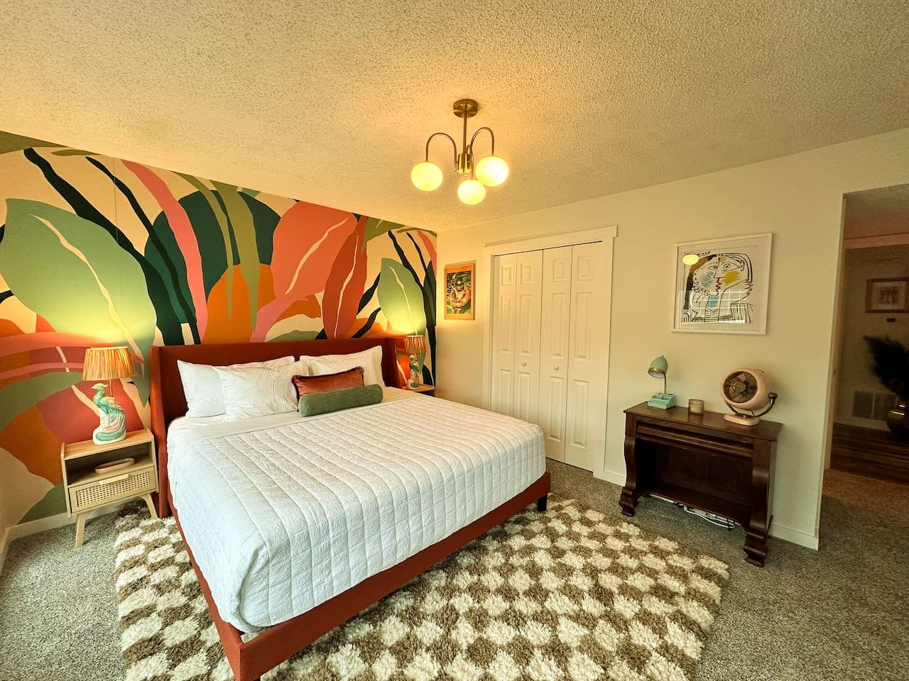 A spacious and vibrant master king bedroom, perfect for unwinding in style after a day by the lake.