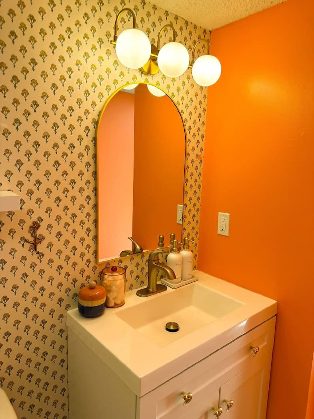 A vibrant and stylish bathroom with modern fixtures and charming decor.