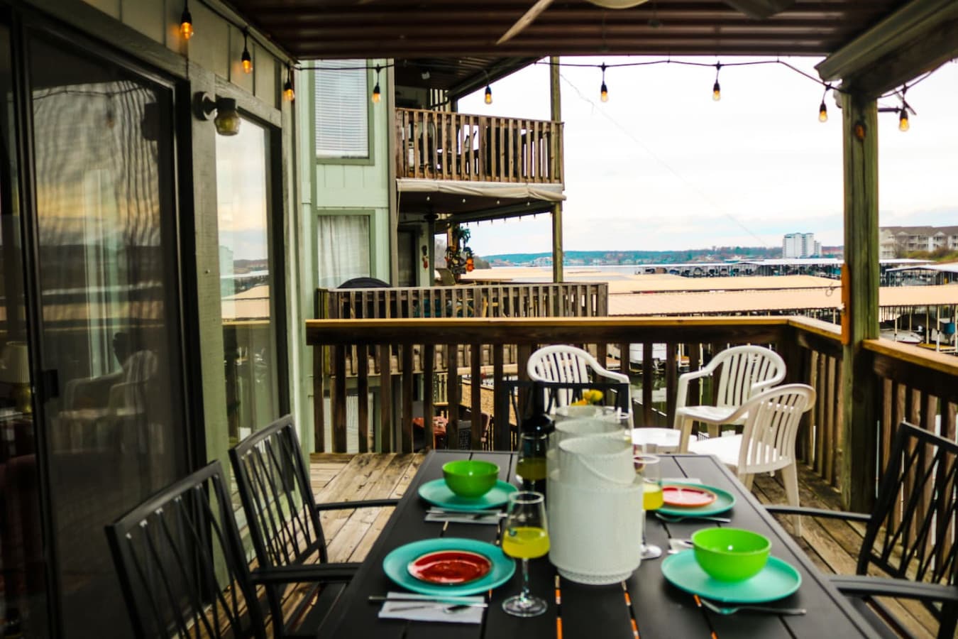 Share memorable meals on this spacious deck, offering picturesque lakeside views and warm, inviting ambiance.