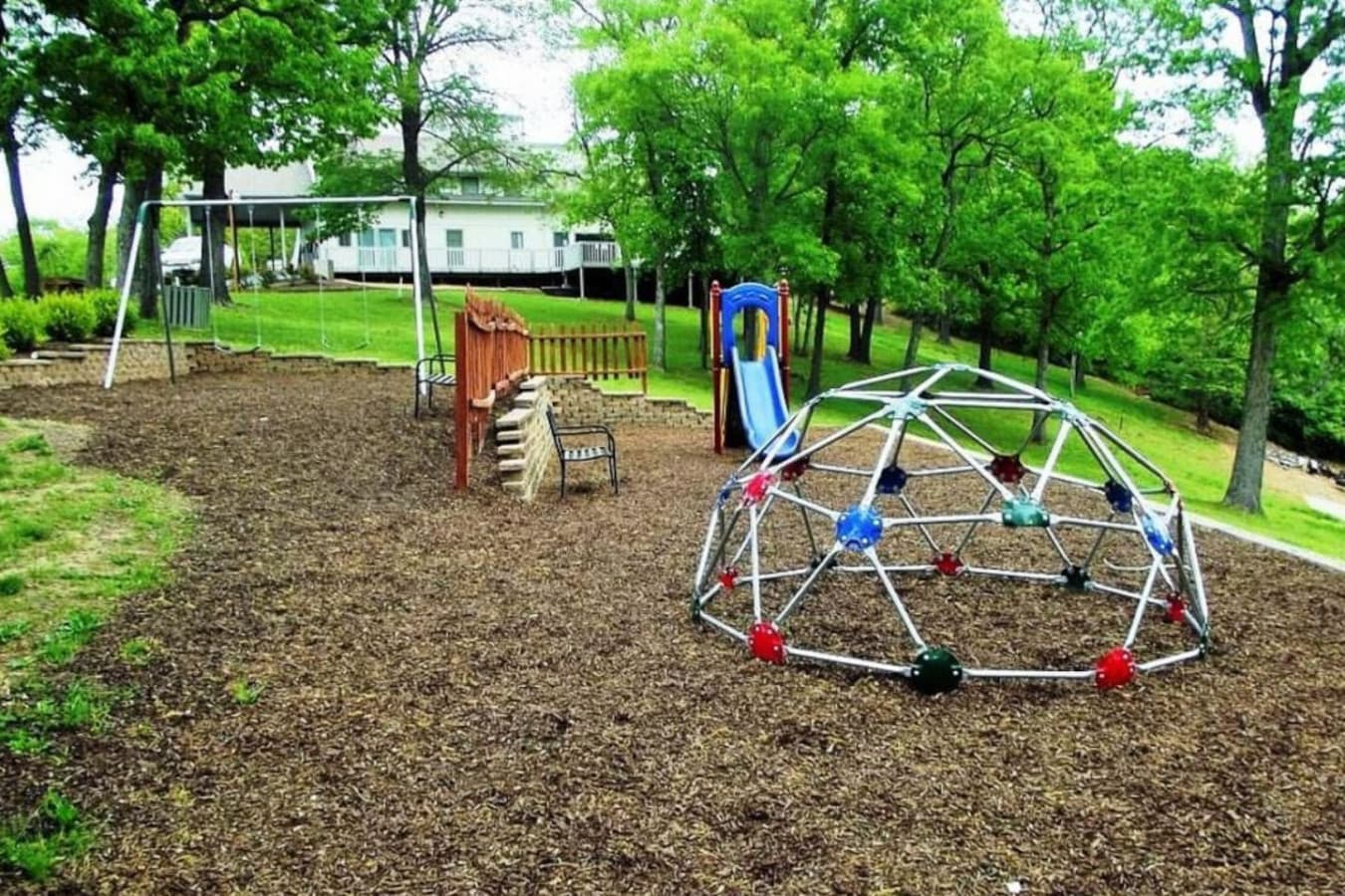 Nestled among the trees, this charming playground is perfect for kids to enjoy during their stay. A wonderful way to unwind and connect with nature!