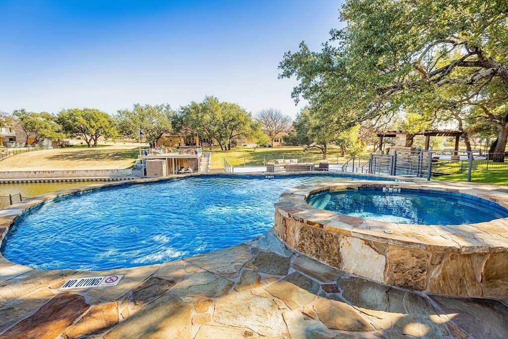Pool and hot tub overlooking the canal