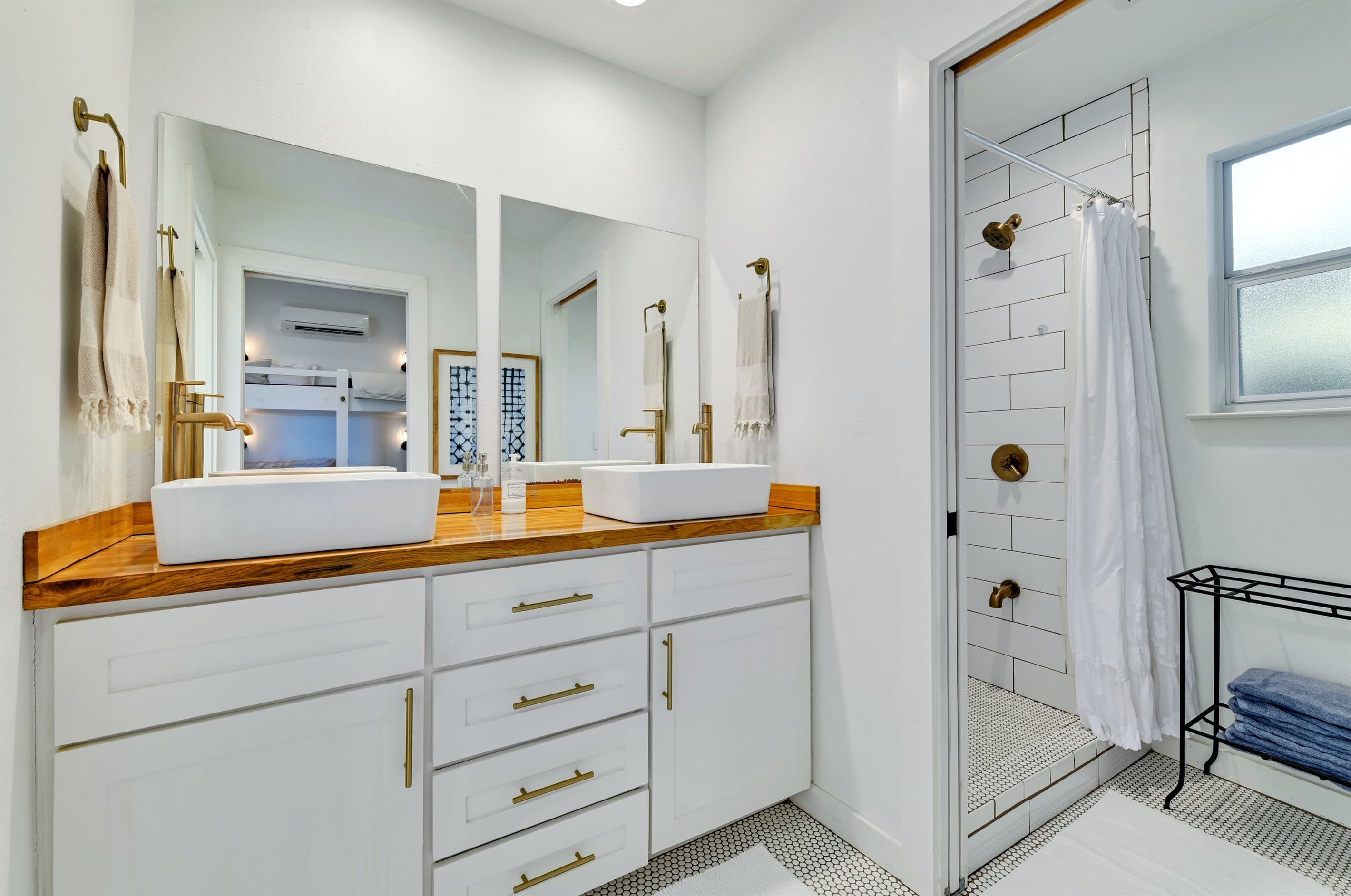 Casita bath with double sinks and stand up shower