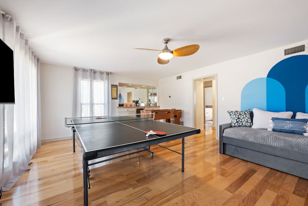 Game room with bar, games, ping pong, games, foosball, day bed with twin trundle
