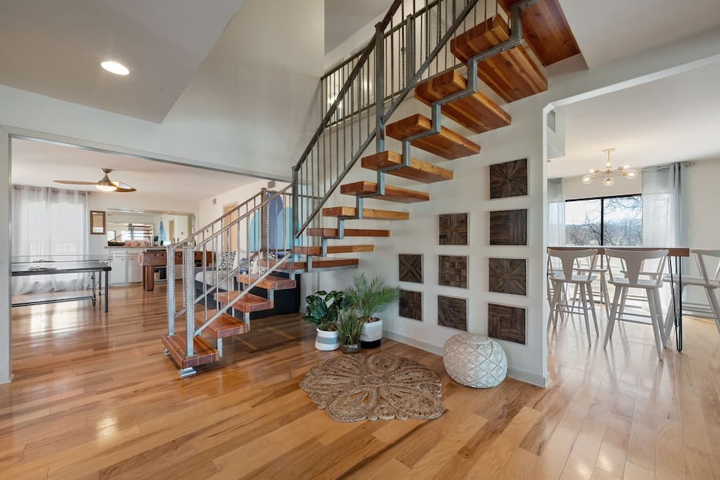 Stairs leading to 4 upstairs bedrooms