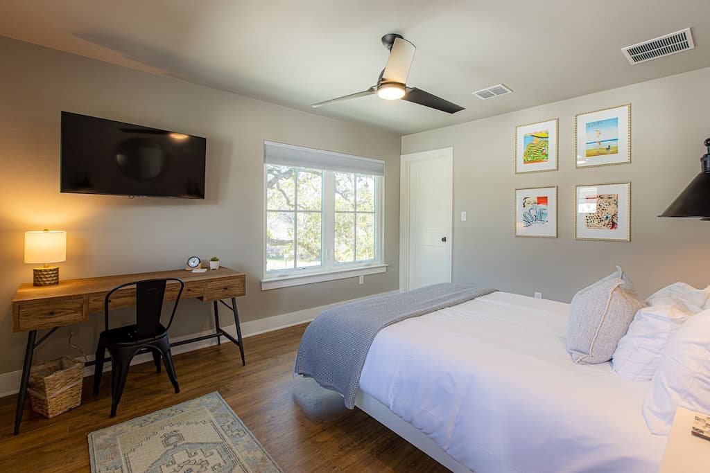 Gray Bedroom - queen bed. Includes workspace.