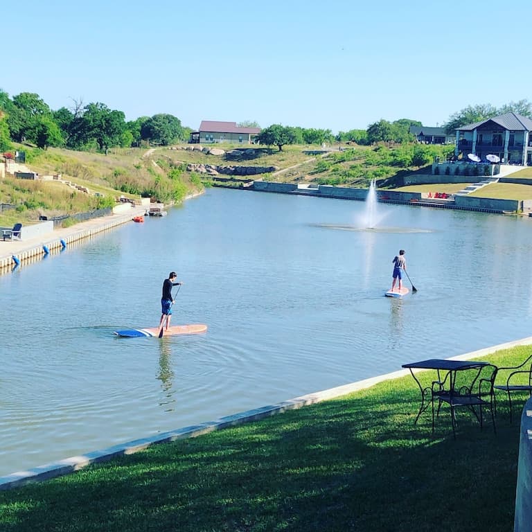 My teenagers paddleboarding :)