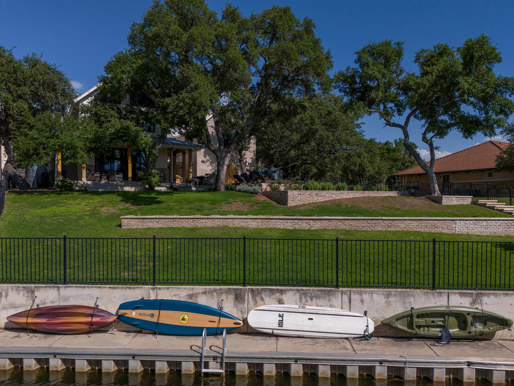 2 kayaks and 2 paddleboards
