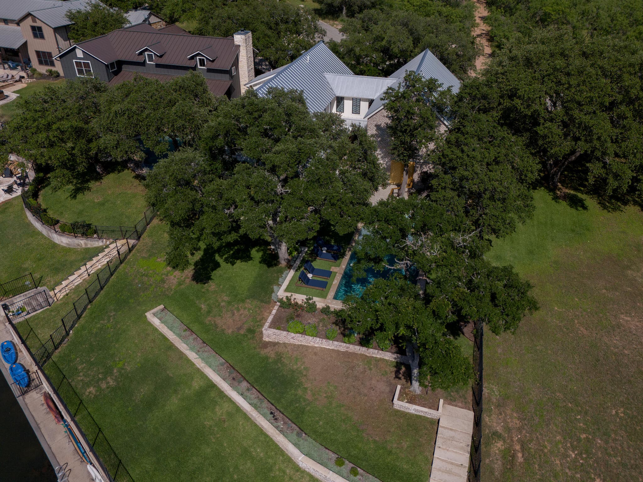 Large shaded yard on canal