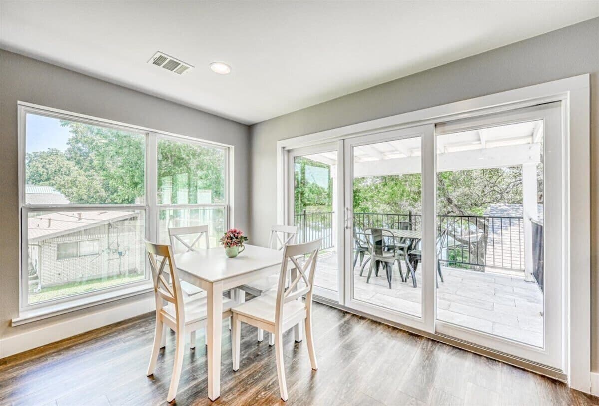 Just Chillin' - breakfast nook with slider leading to balcony