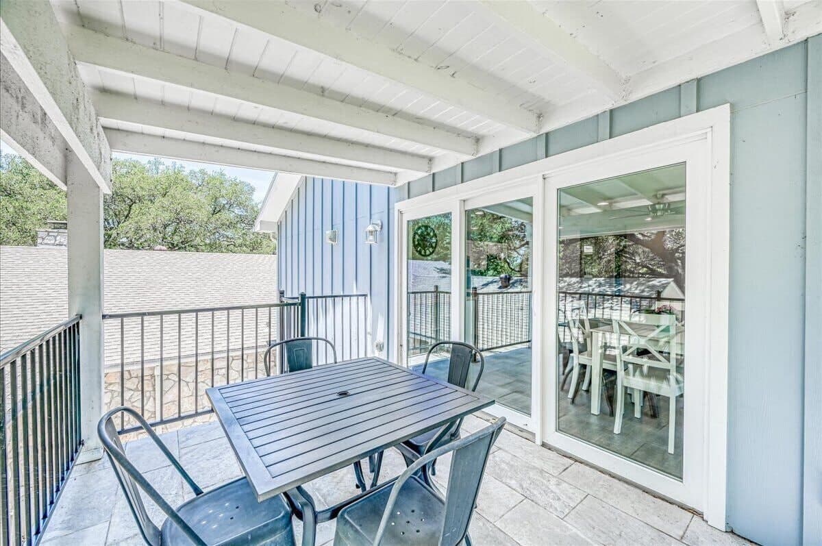 Just Chillin' - outdoor balcony with table and chairs