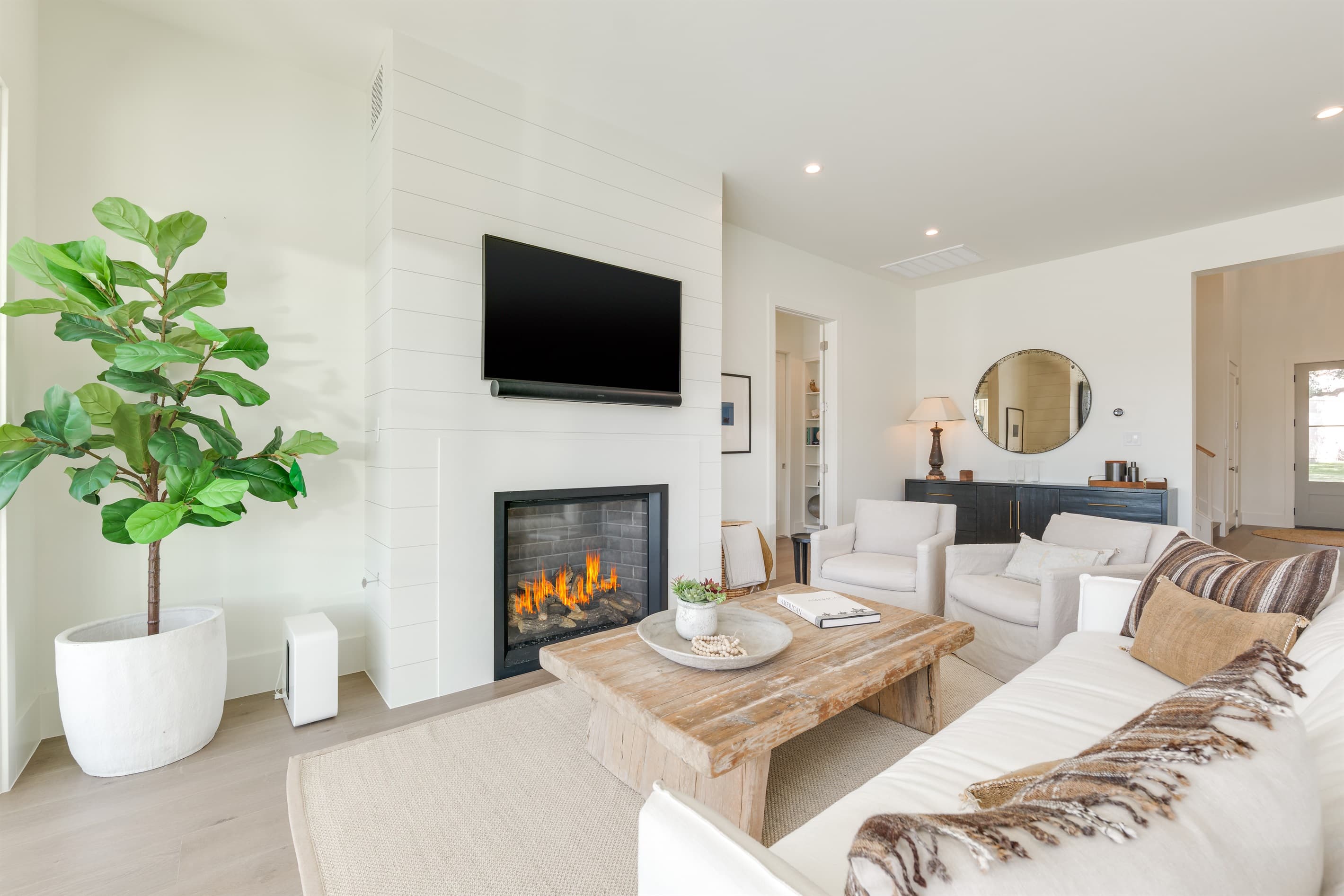 Living room with fireplace and lots of seating
