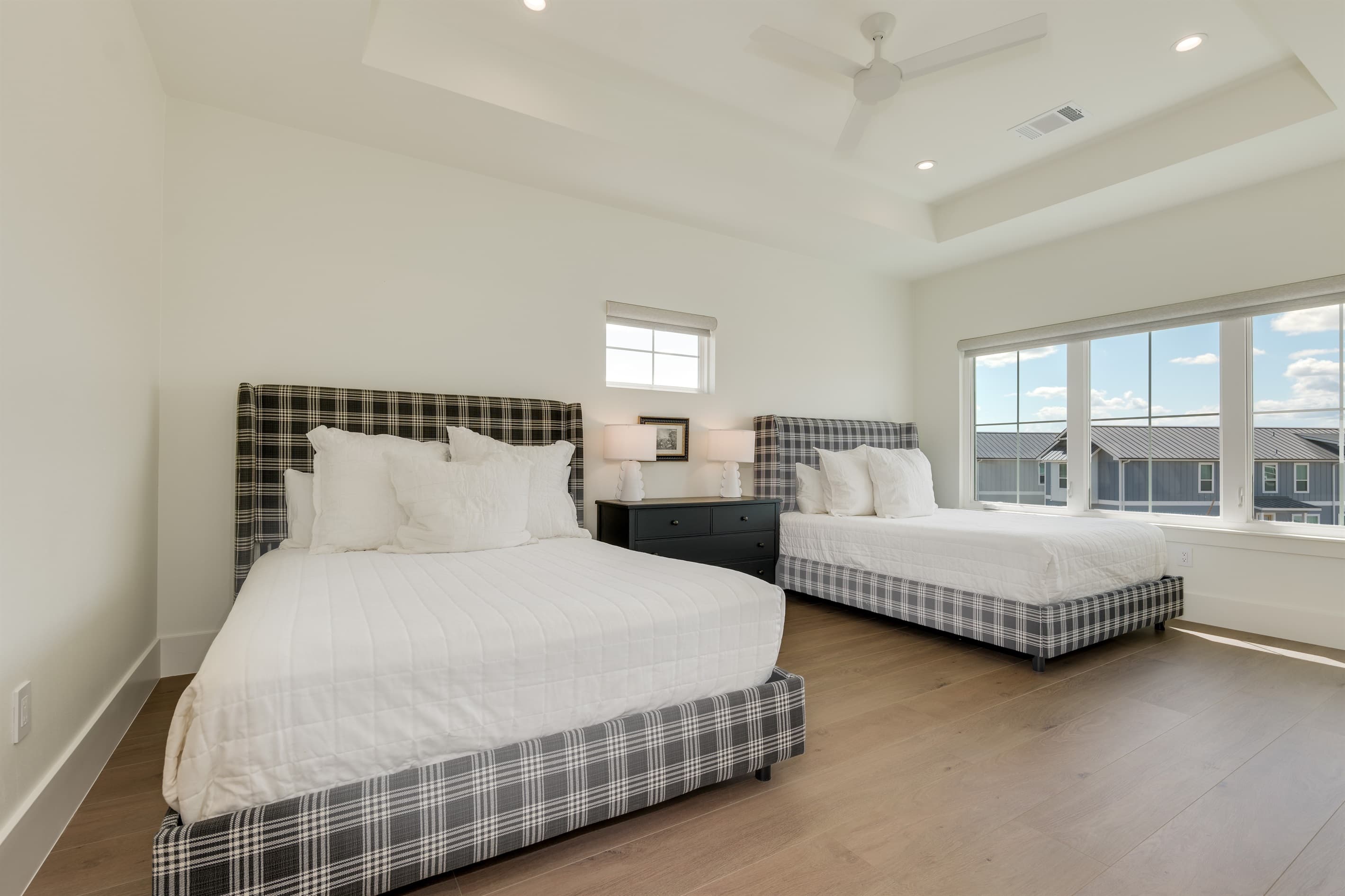 Bedroom 3 with 2 queen beds and ensuite bathroom