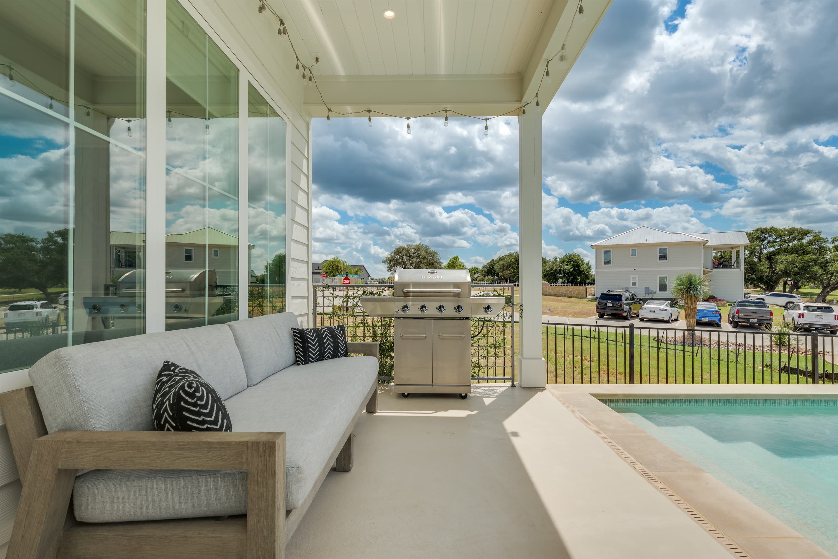 Comfortable lounge seating and grill with lake views