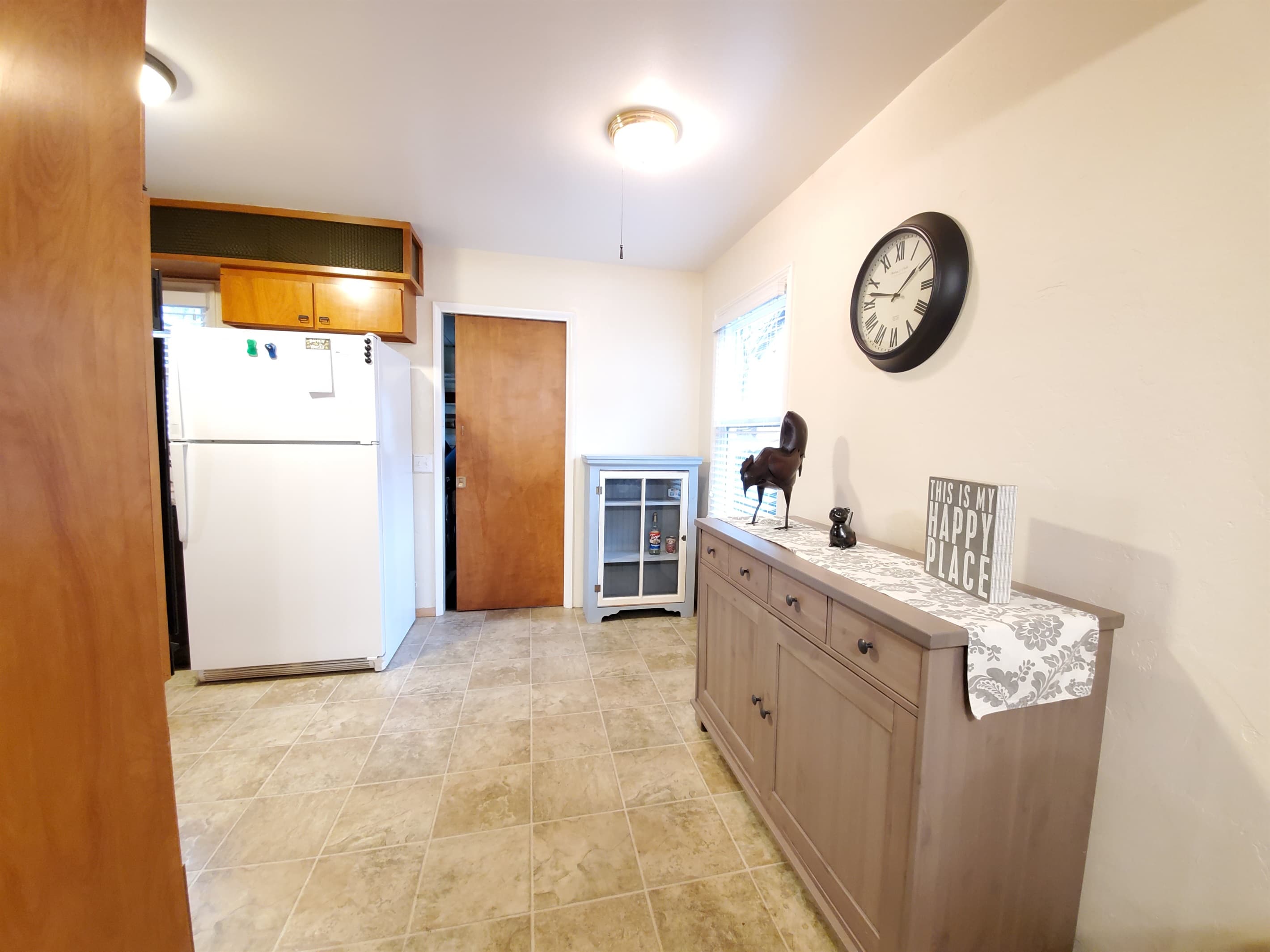To Kitchen & wash room