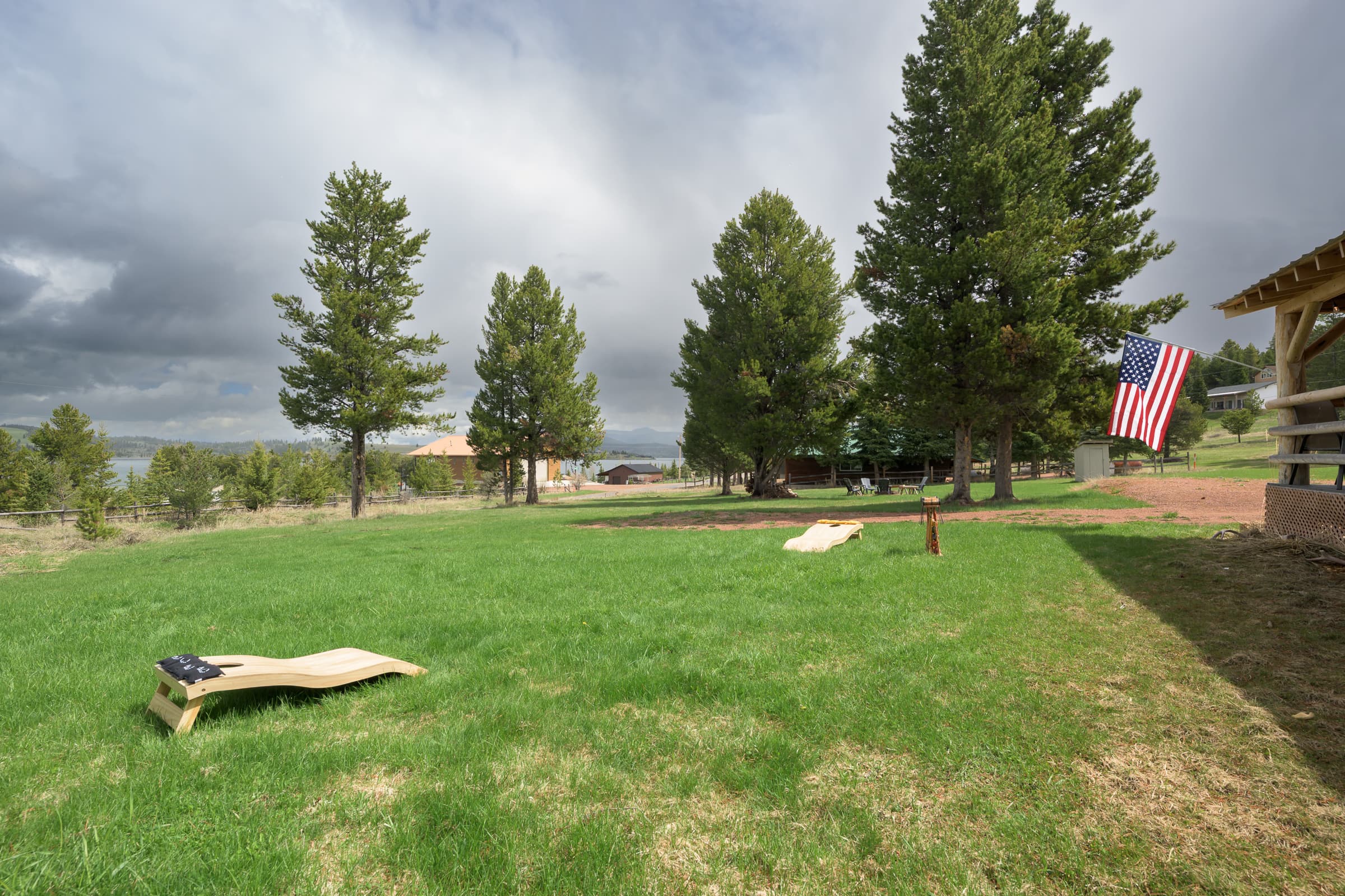 This oversized backyard has room for yard games (provided)