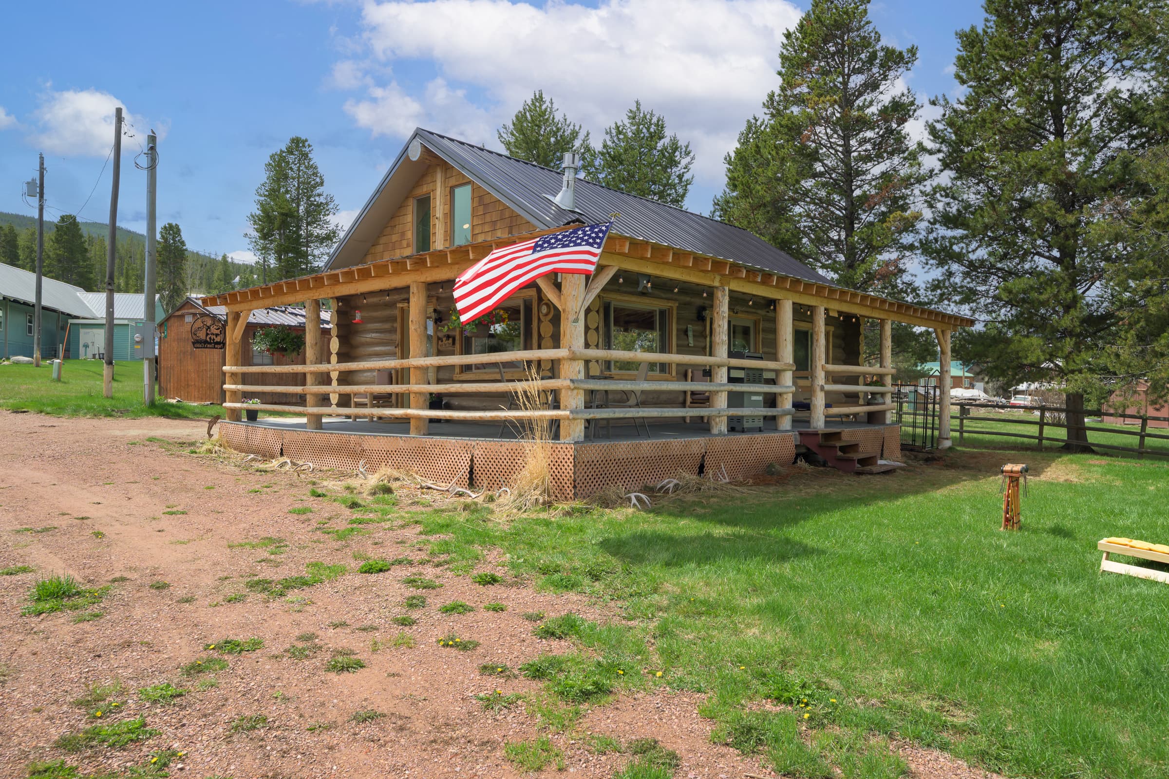 A true log cabin, with wrap around porch