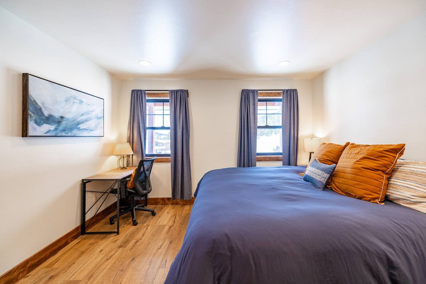 Primary suite with king bed and a desk for work-from-lake