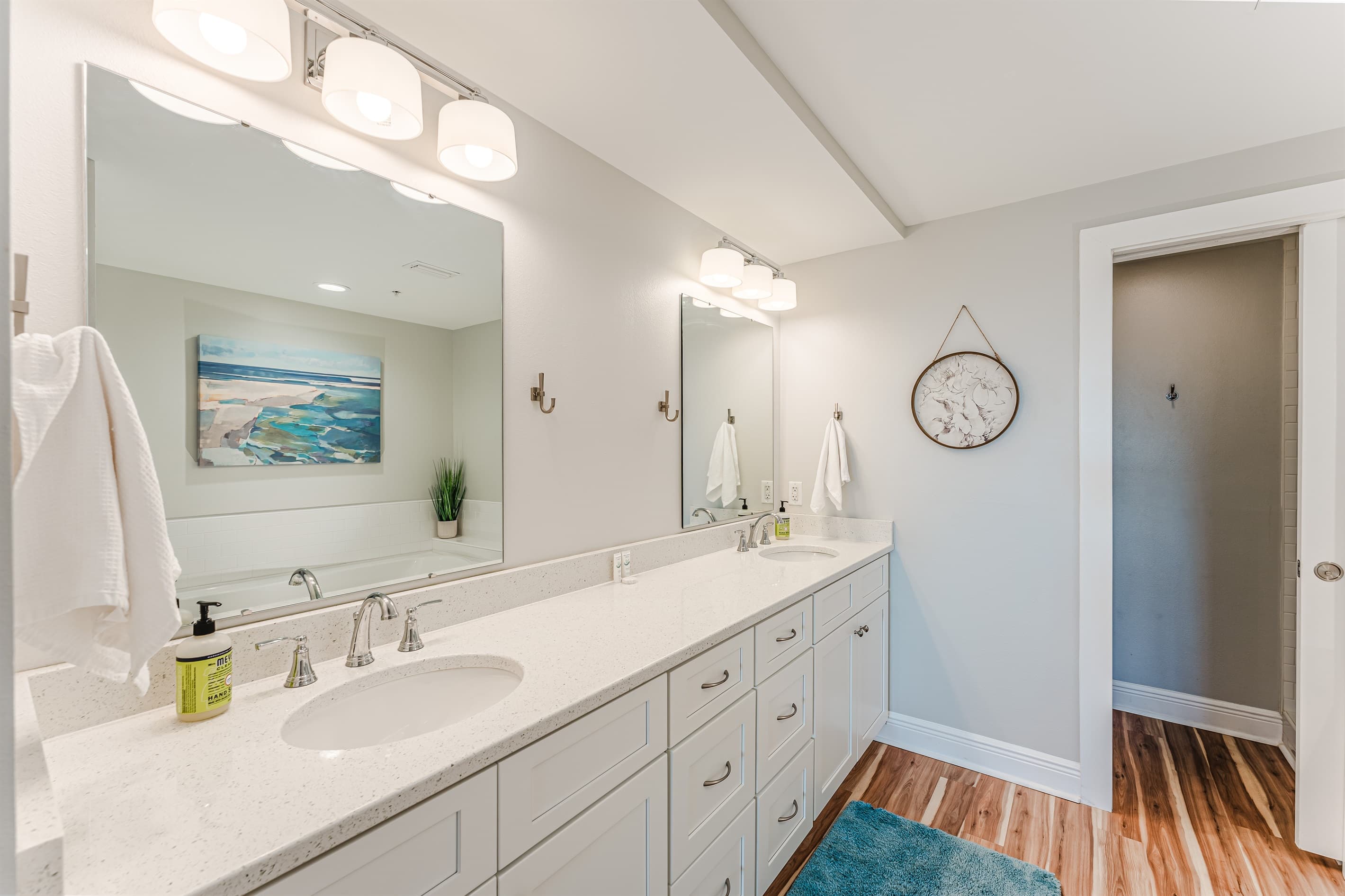 Lots of space & storage in the beautiful white bathroom