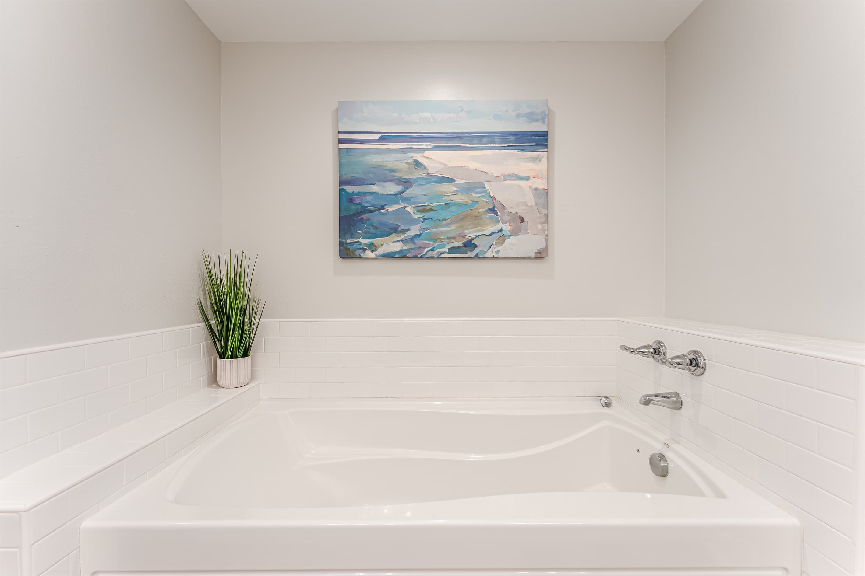 Large soaker tub in Master bathroom