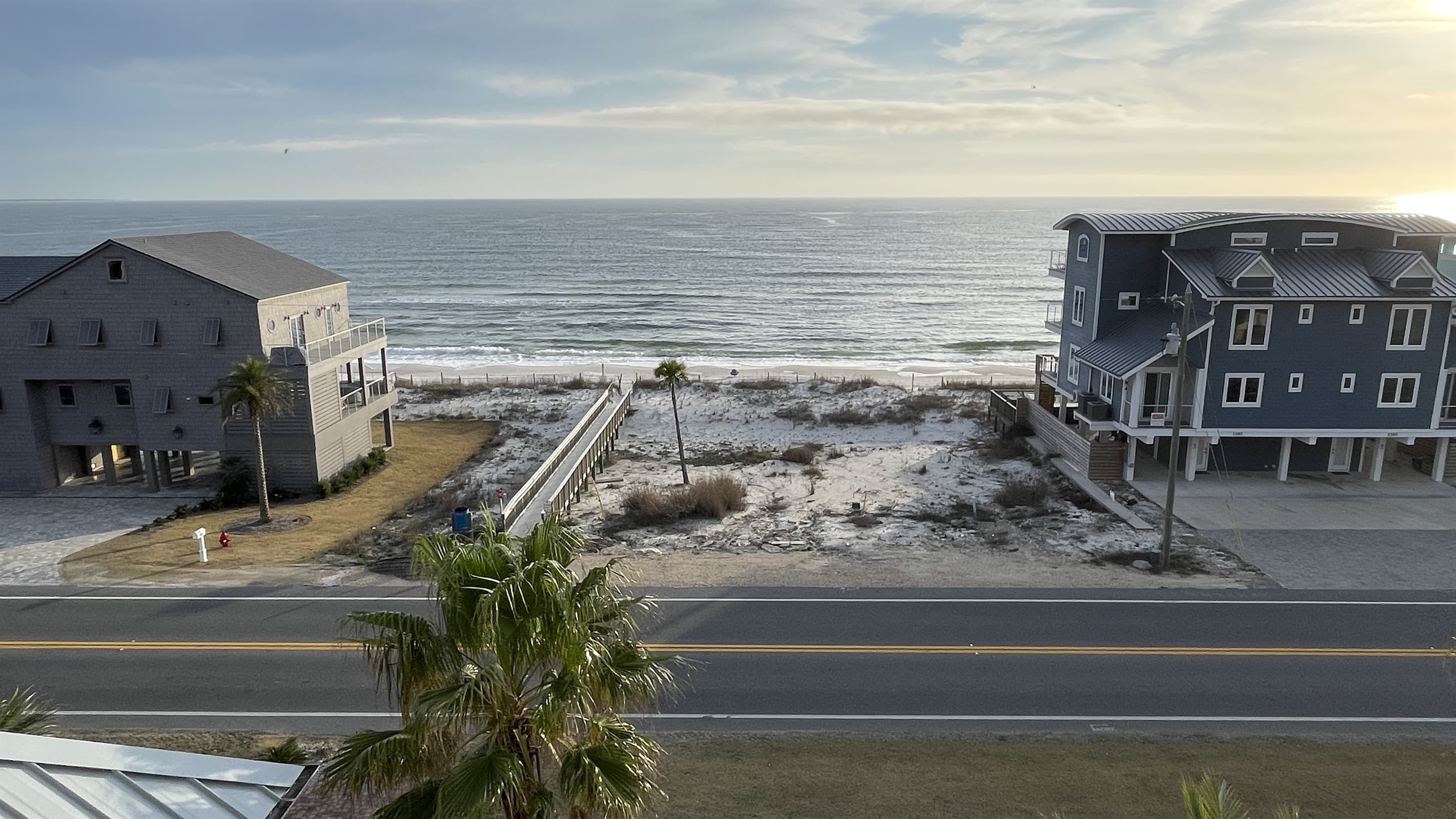 Here’s how close the beach is! Guests love the easy access. (photo taken from 4th floor common area)