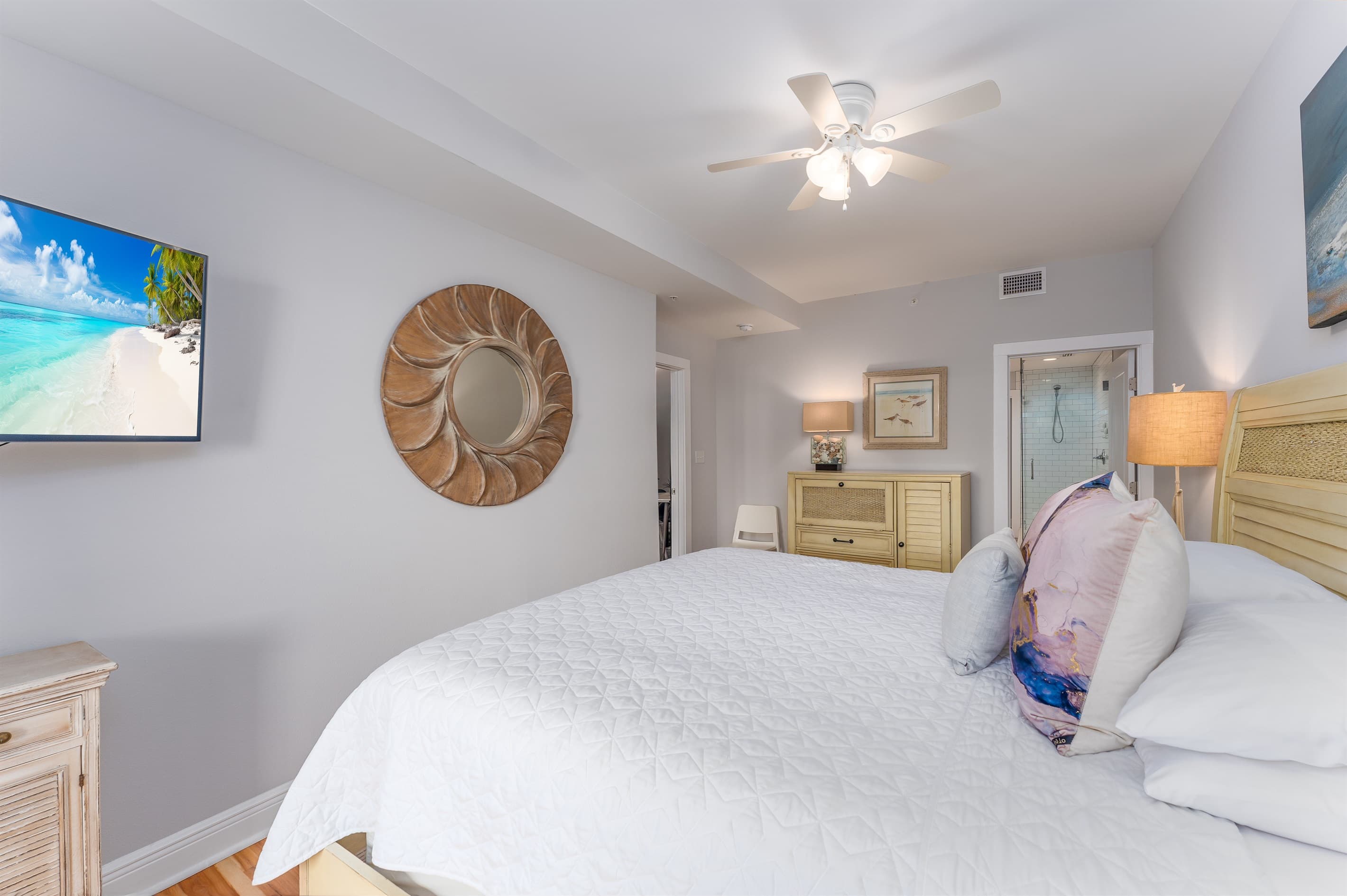 Primary bedroom: ceiling fan, LG TV