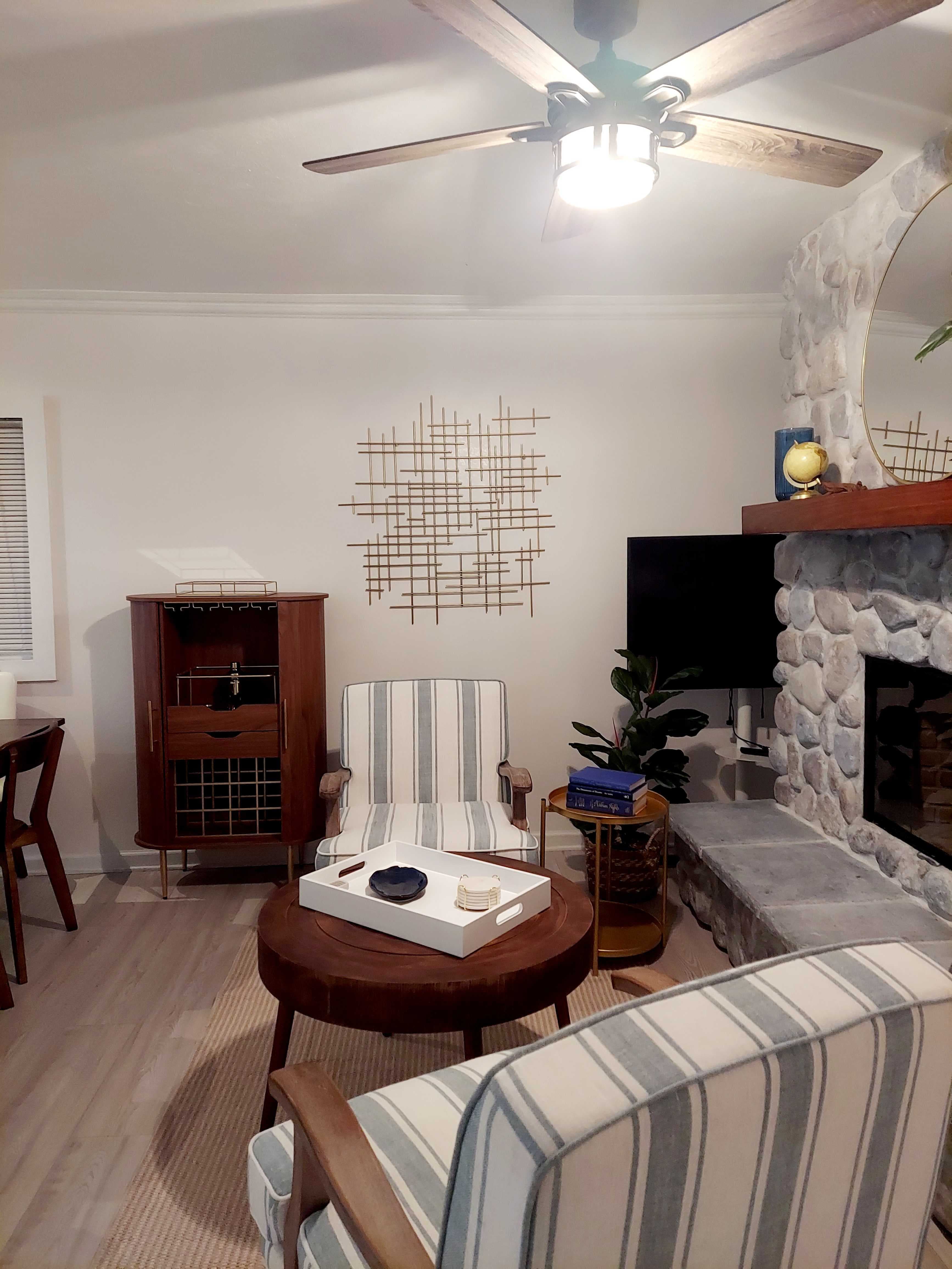 Cozy seating in front of the fireplace for coffee, conversation, or games.