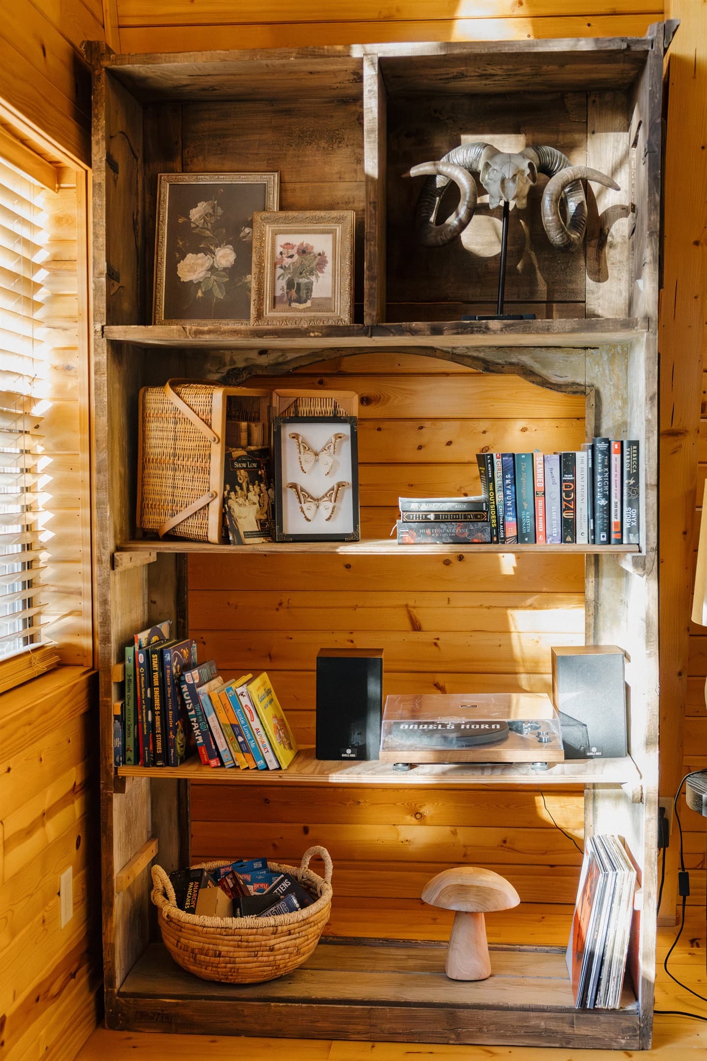 Rustic charm meets modern entertainment at Poppywood Pines. This gothic western A-frame in Show Low features curated decor, vintage records, and books for all ages. Your perfect White Mountains escape blends authentic character with cozy cabin comfort.