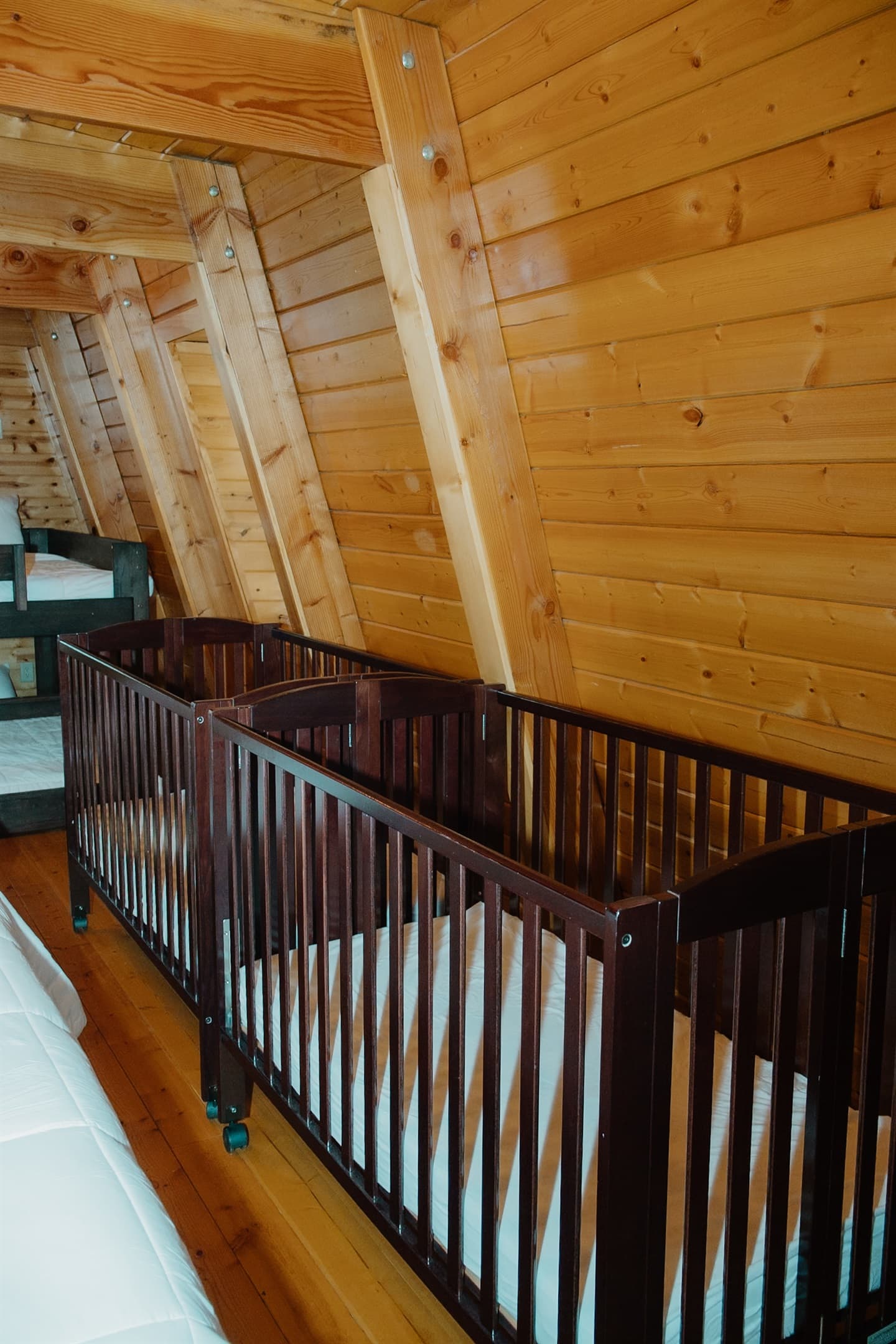 Two full-size cribs with mattresses and sheets available at no extra charge—just let us know! This room also features baby gates, a high chair and a pack n' play.