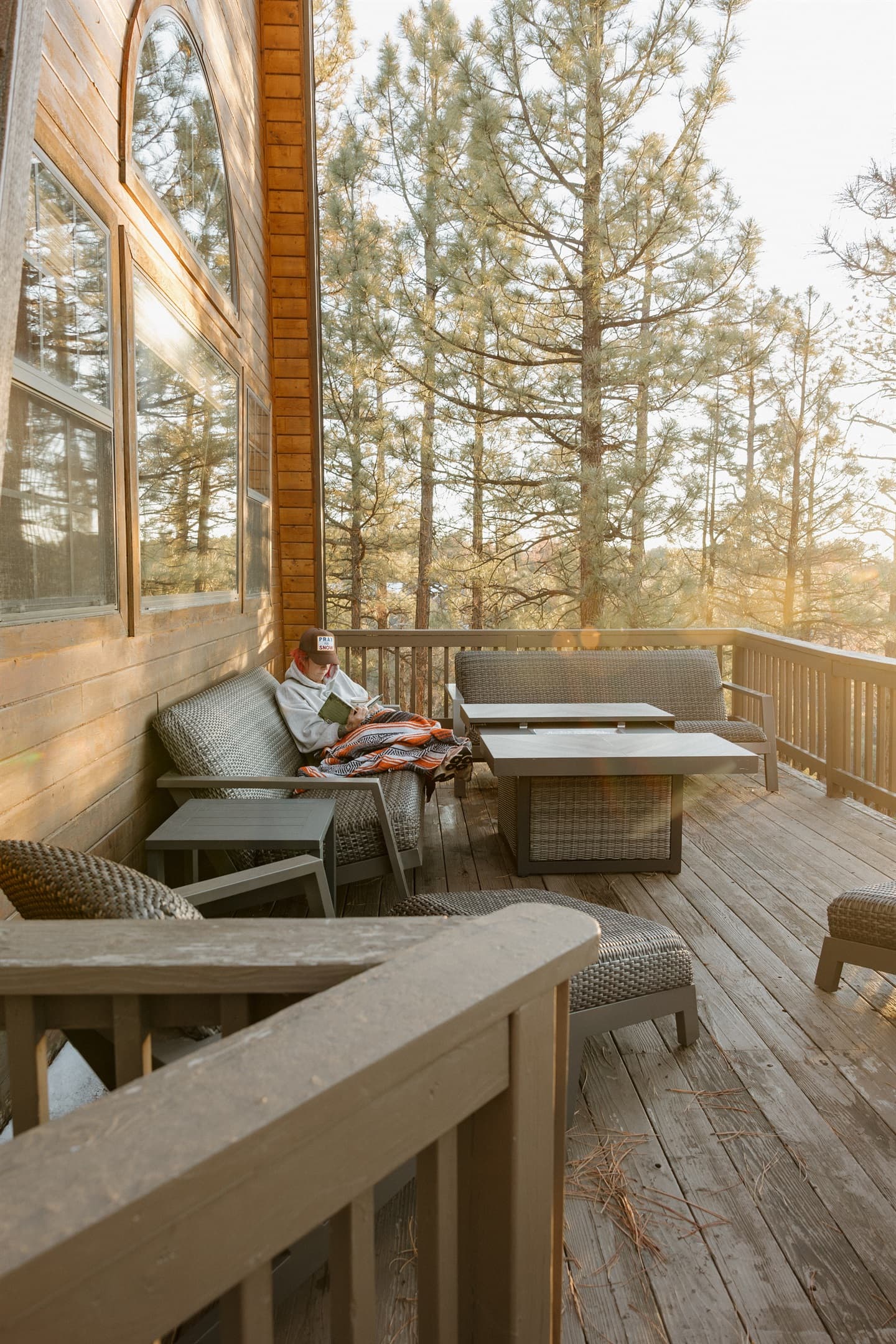Relax on the spacious deck at Poppywood Pines with comfortable seating and forest views. This peaceful Show Low retreat offers the perfect spot for morning coffee or reading, surrounded by towering ponderosa pines in the heart of the White Mountains.