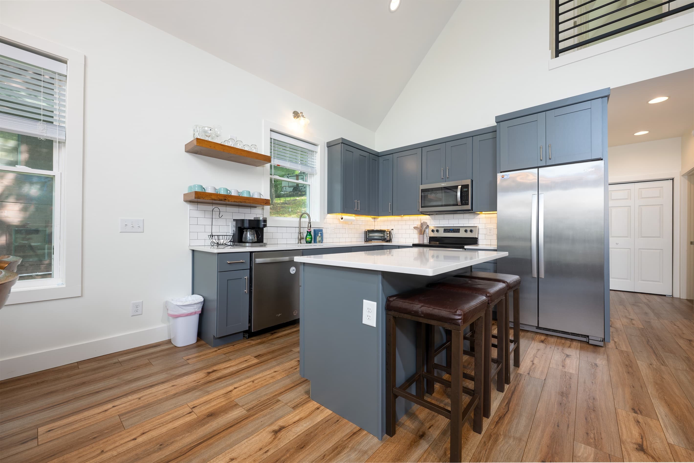 Kitchen-Cooking basics, stainless steel appliances, kitchen island for 3, coffee maker