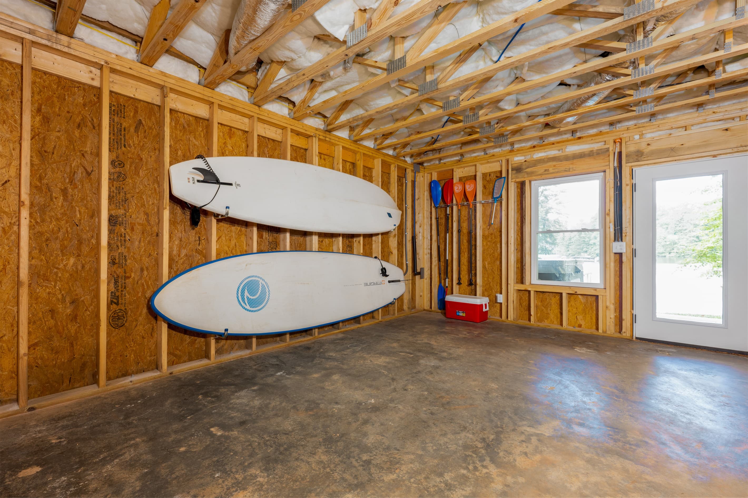 Basement- Paddle boards and Oars