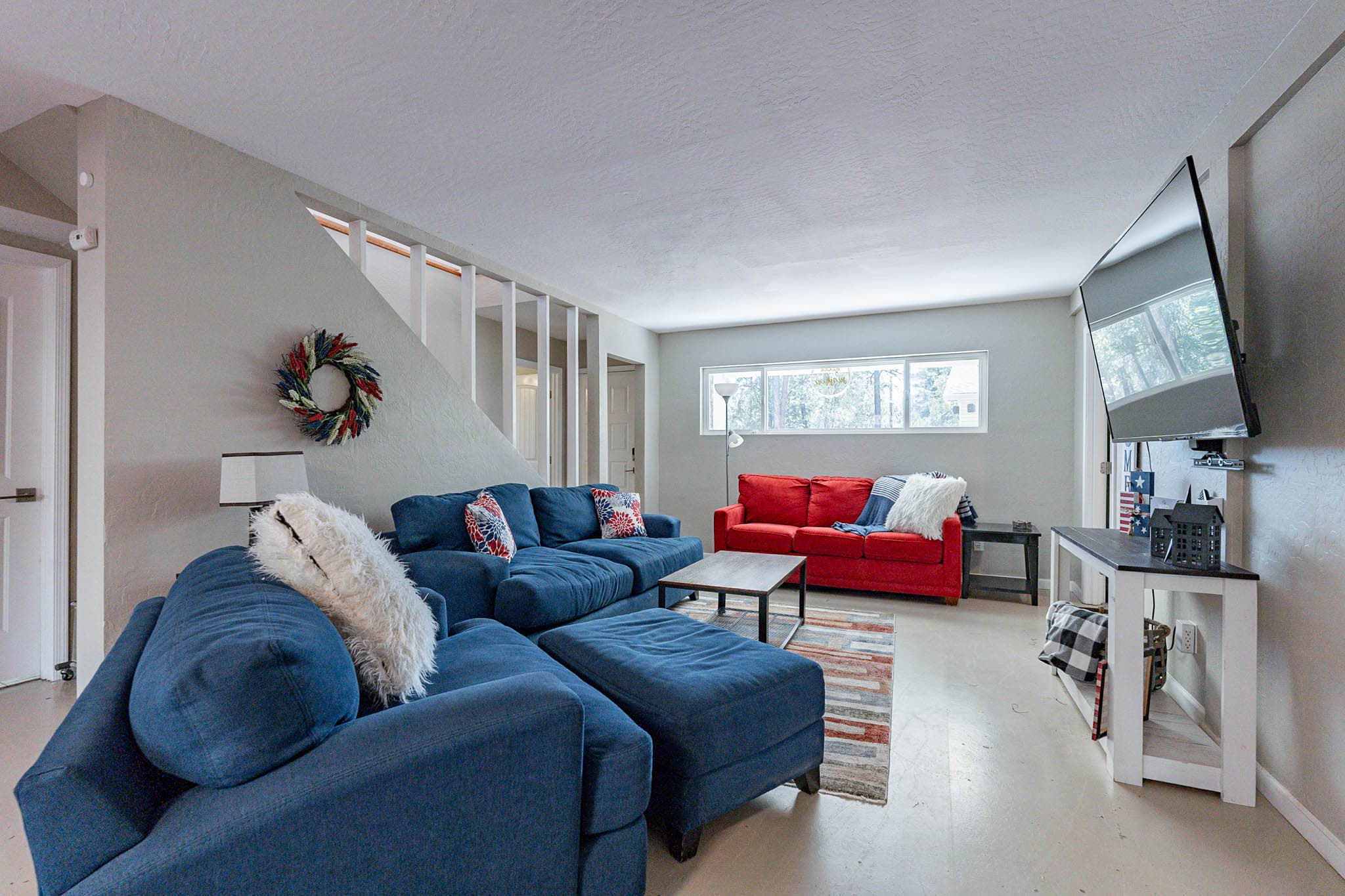 The downstairs family room gives everyone somewhere to relax.  Ample space for everyone!