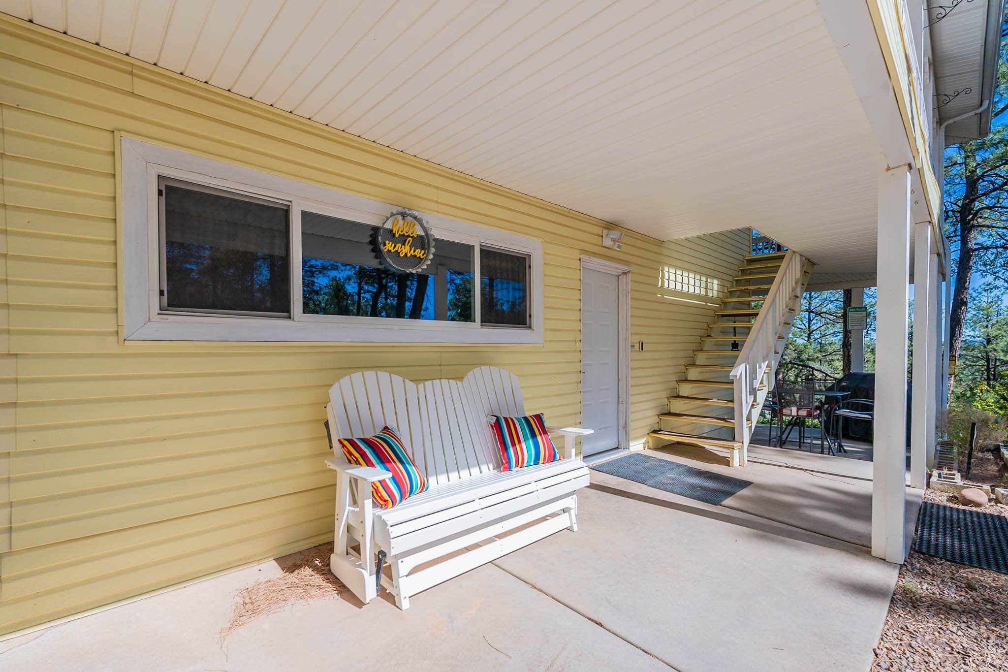 Relax while soaking up the peace and tranquility on the porch swing