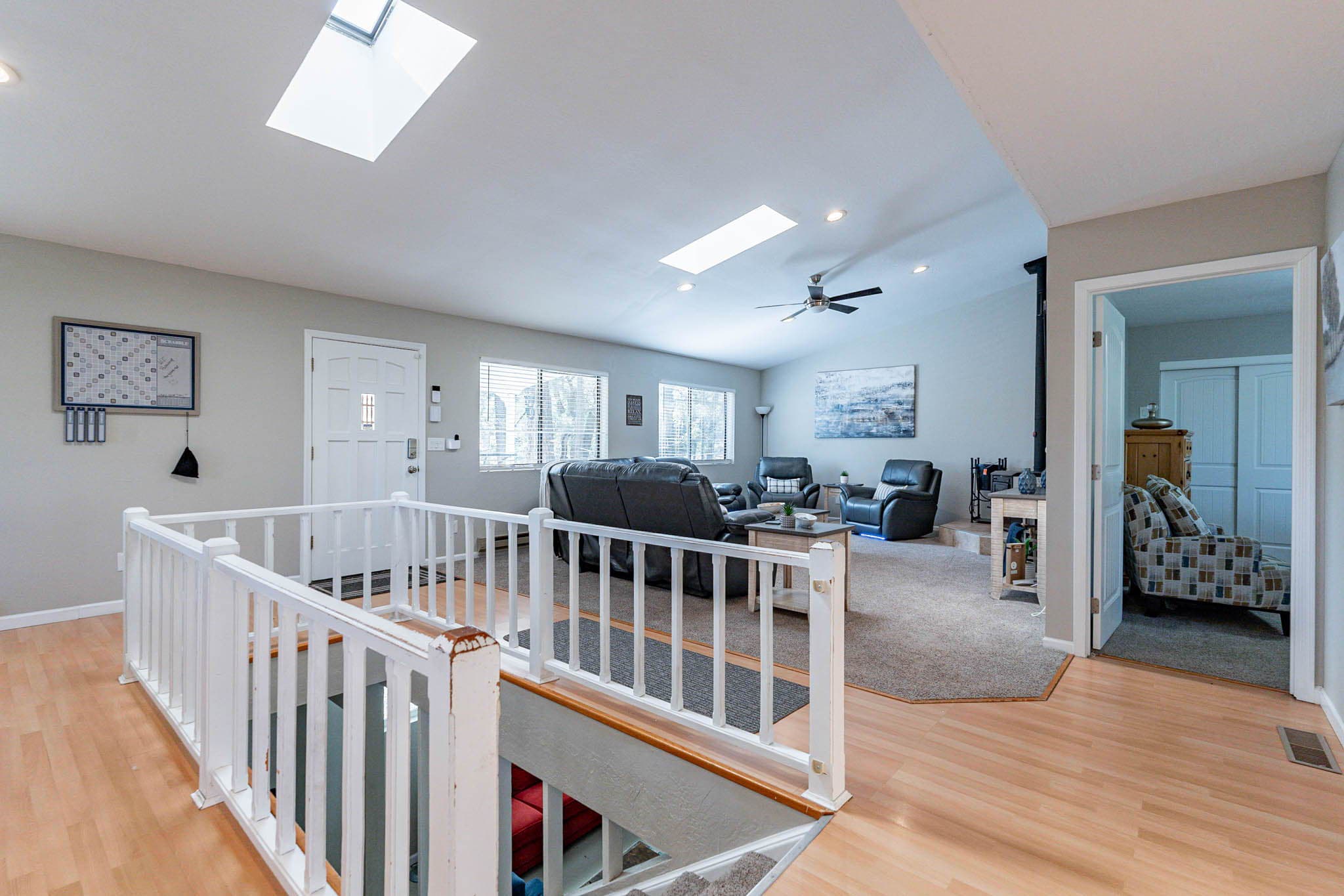 Downstairs has more living space and bedrooms