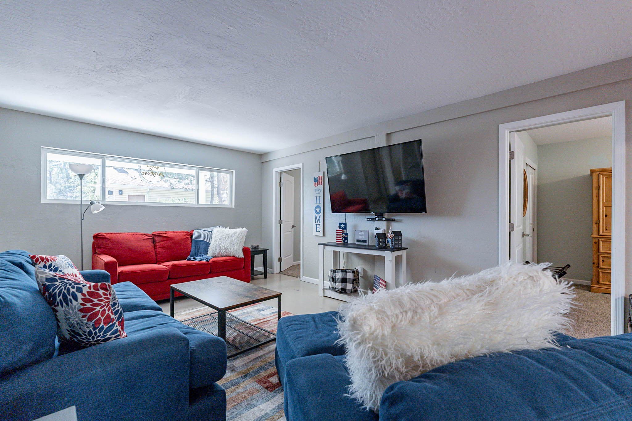 The downstairs family room is the perfect place to gather and watch a movie
