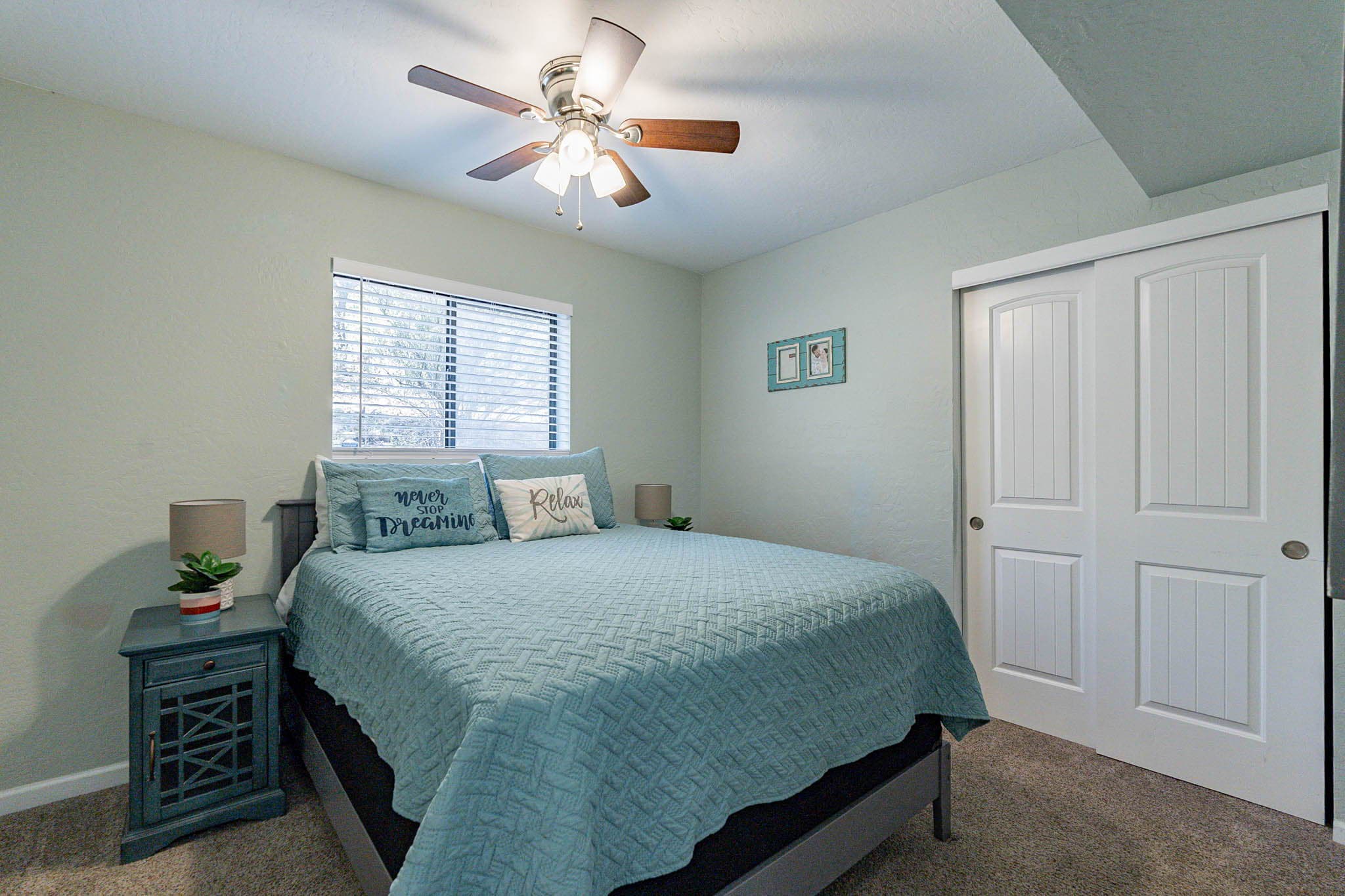 Bedroom 5 with ceiling fan and closet.  Plenty of space for the whole group.