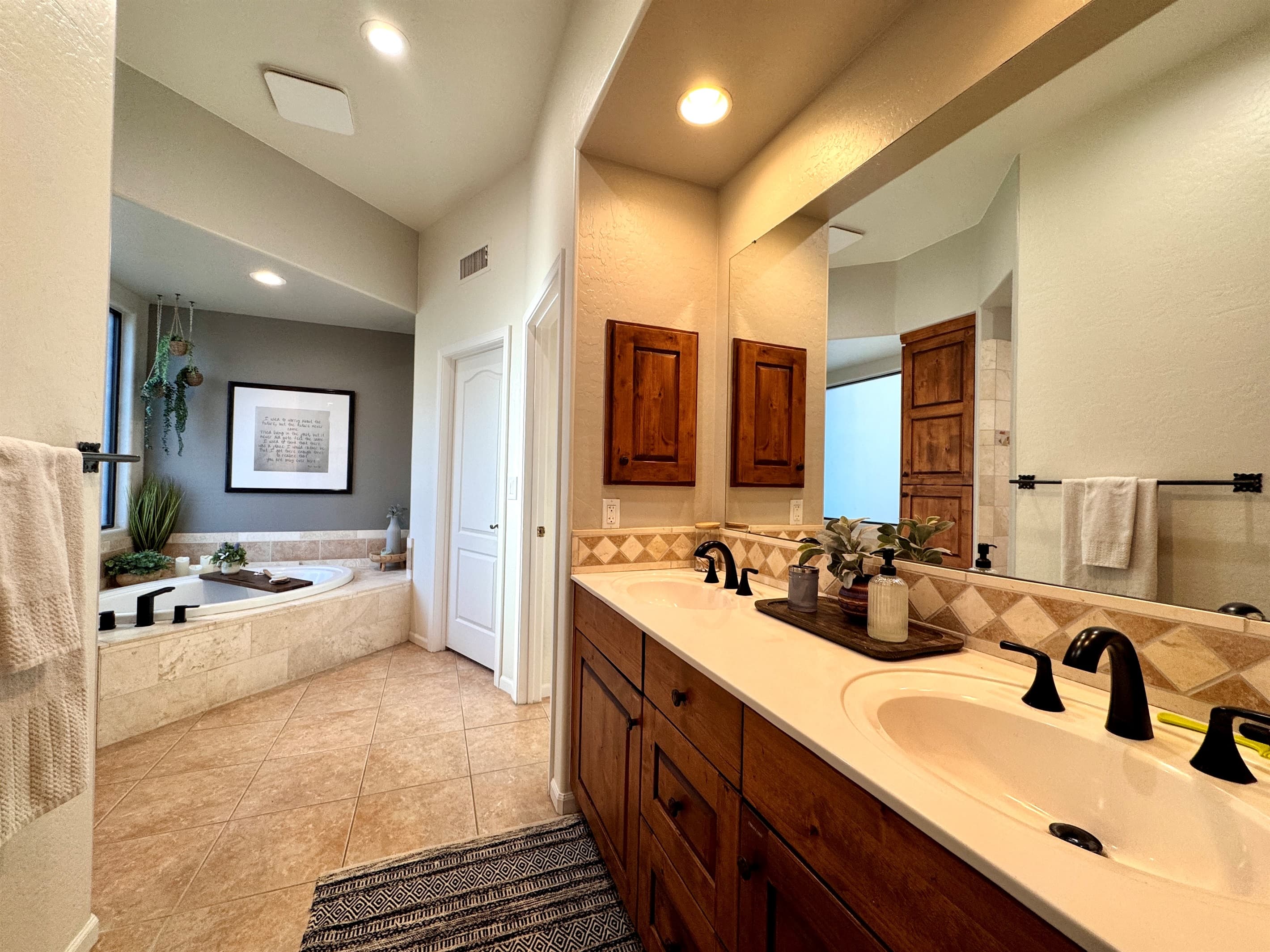 Large double vanity with plenty of counter top and storage to make getting ready a breeze. Hair dryer and curling iron provided so leave that room in your suitcase for more important items!