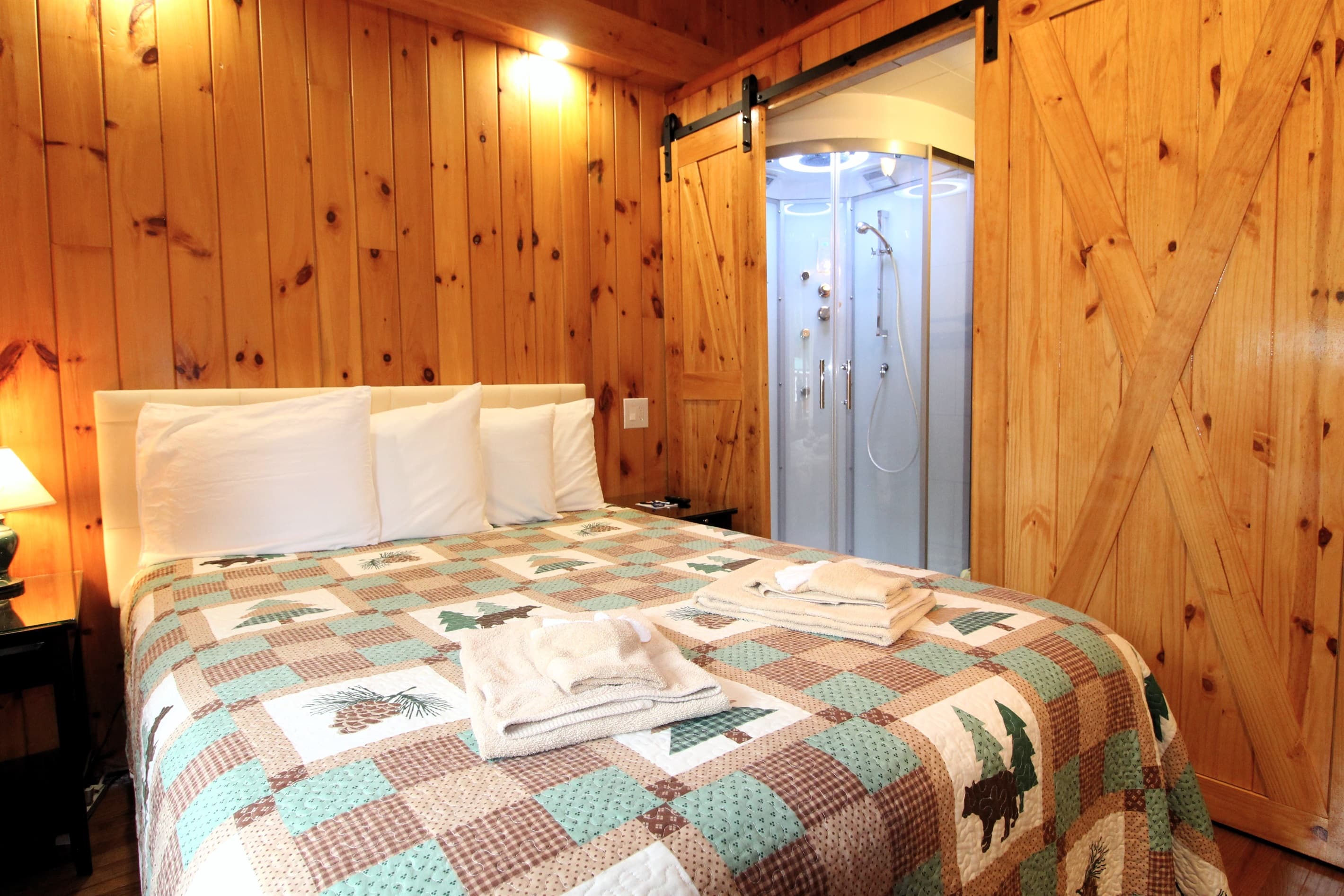 Bedroom #3 with queen size bed and en suite bath with massage shower and bidet toilet