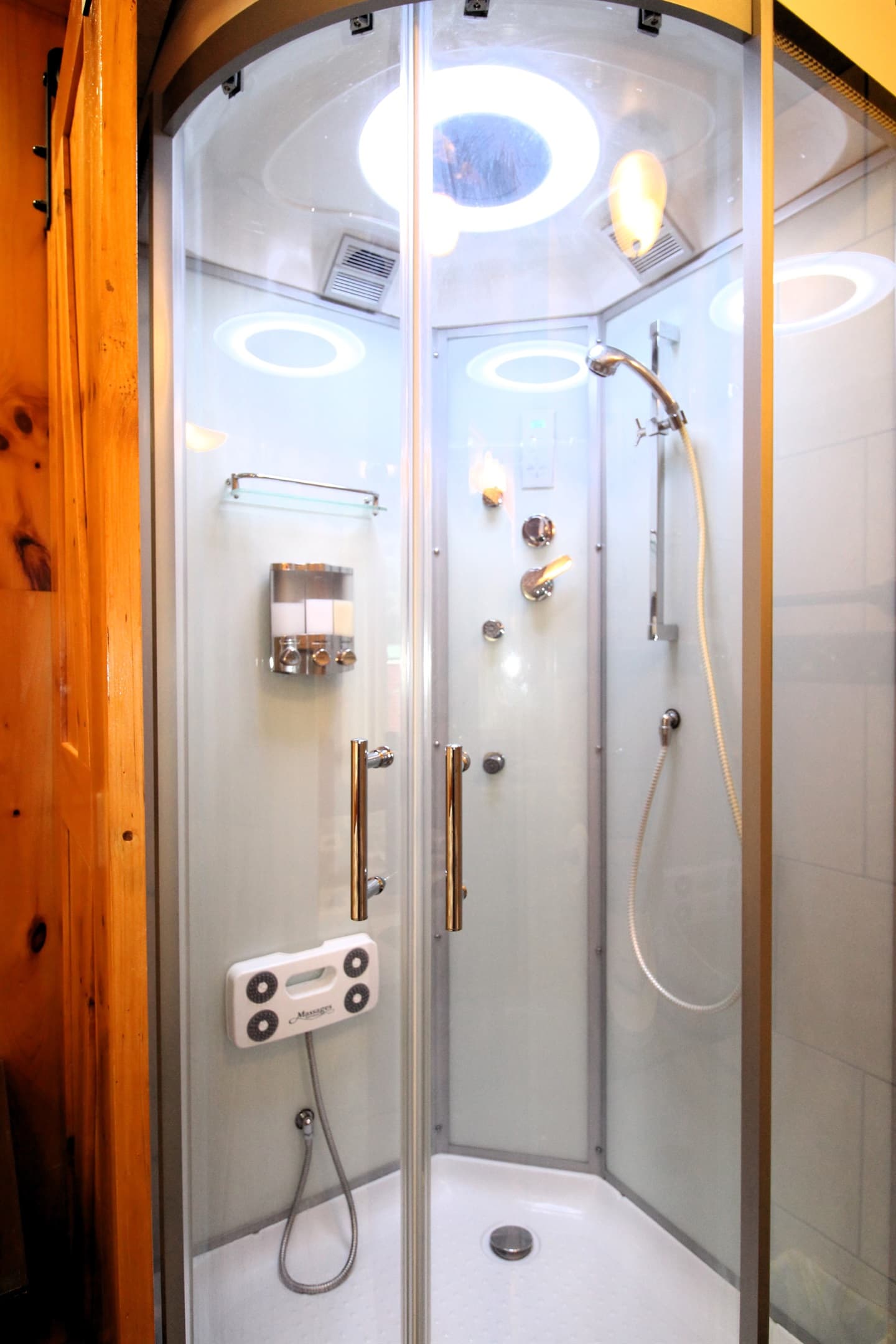 ...rainfall shower head and radio with bluetooth connectivity