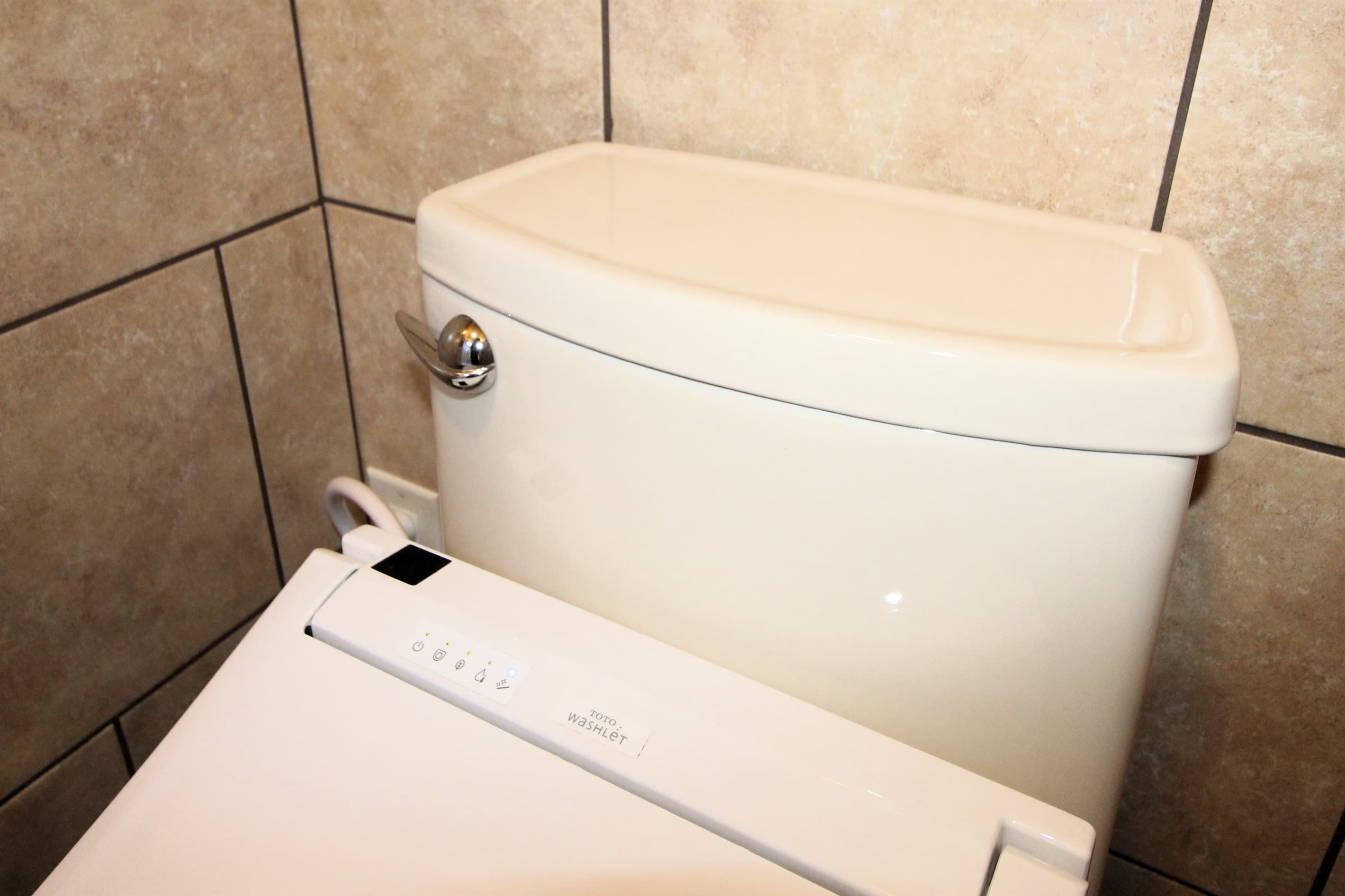 Toto Washlet bidet toilet with remote