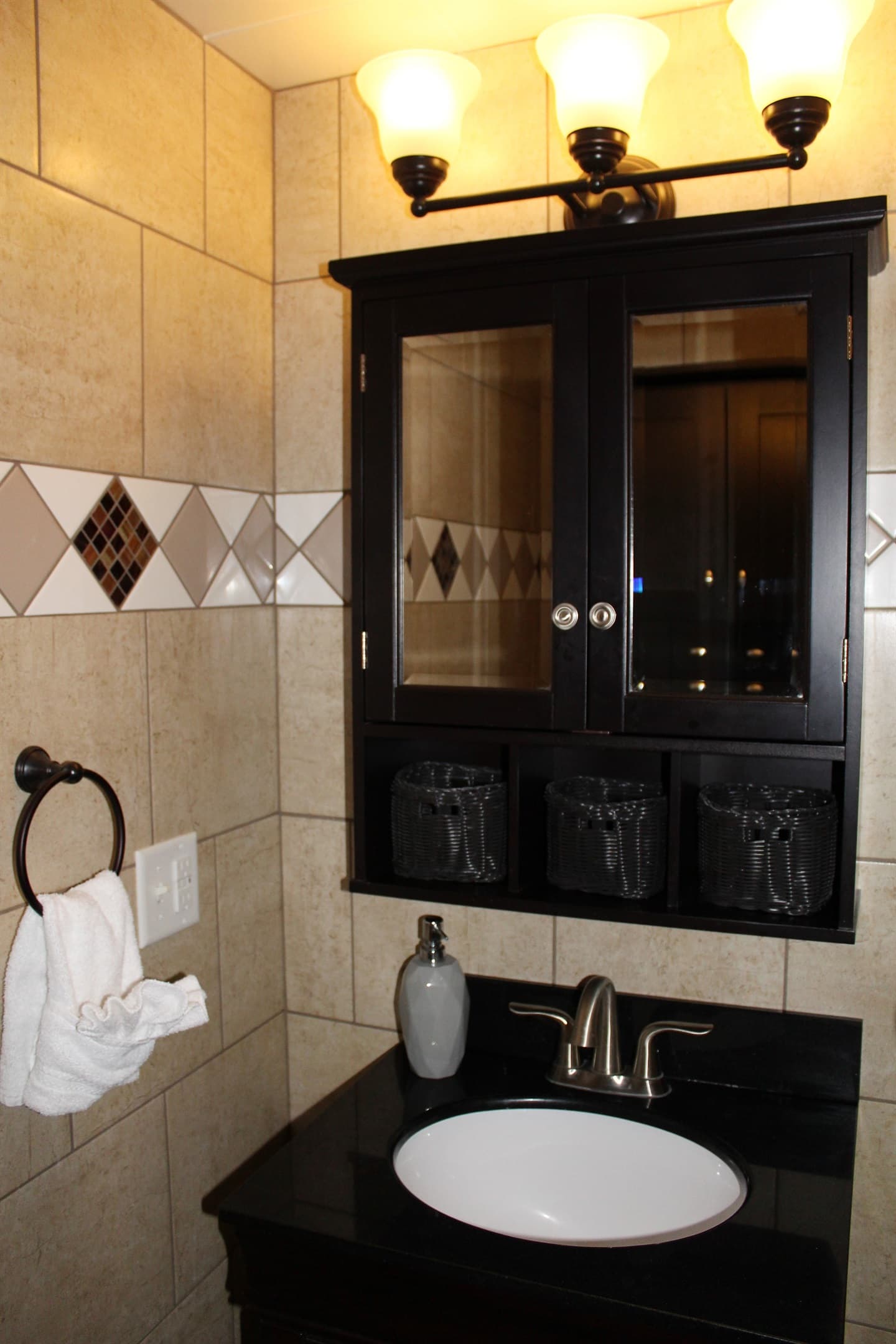 Bathroom in bedroom #1 - fully tiled with stall shower