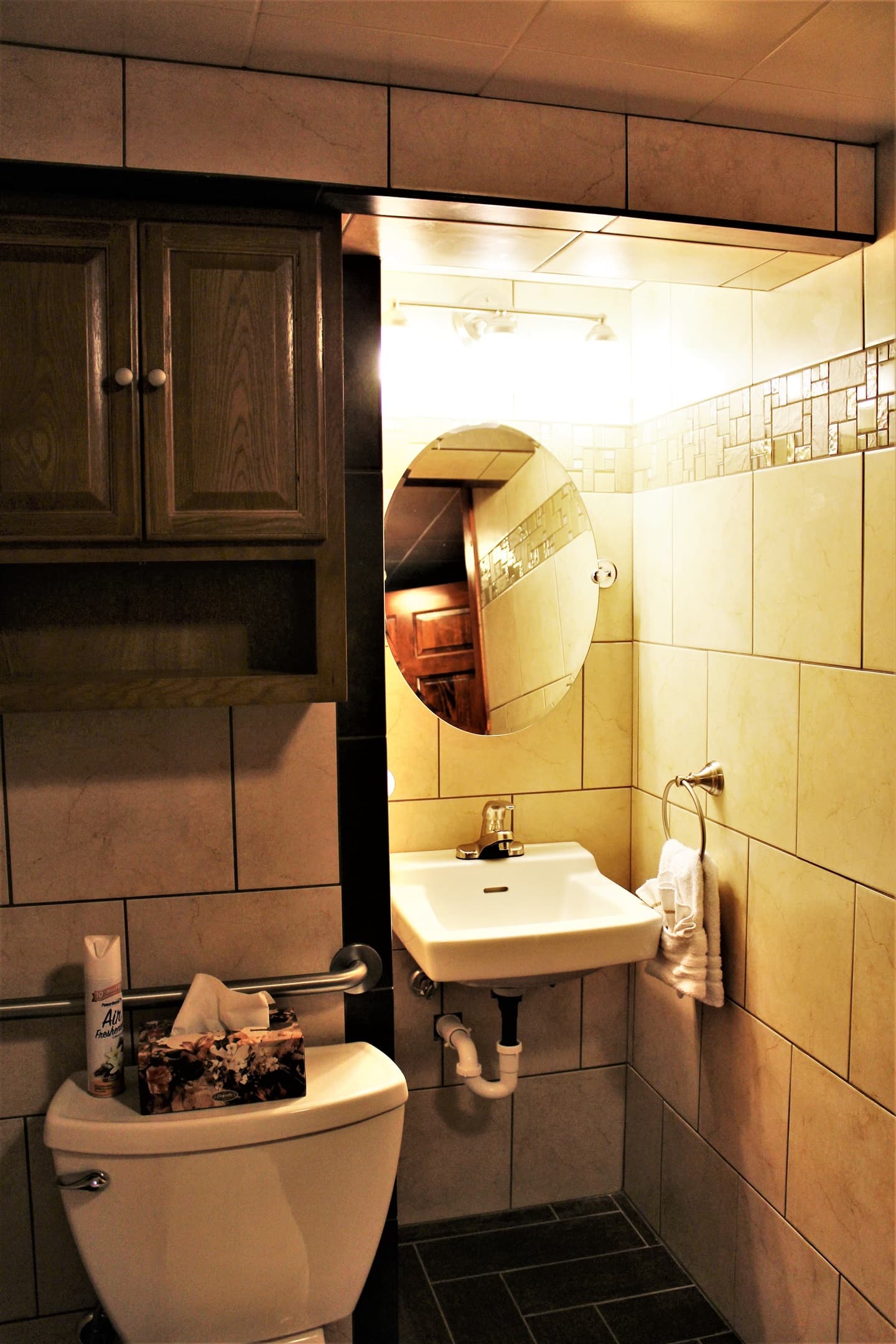 Bathroom #3 off bedroom #3, lower level, with bonus lavatory in the bedroom