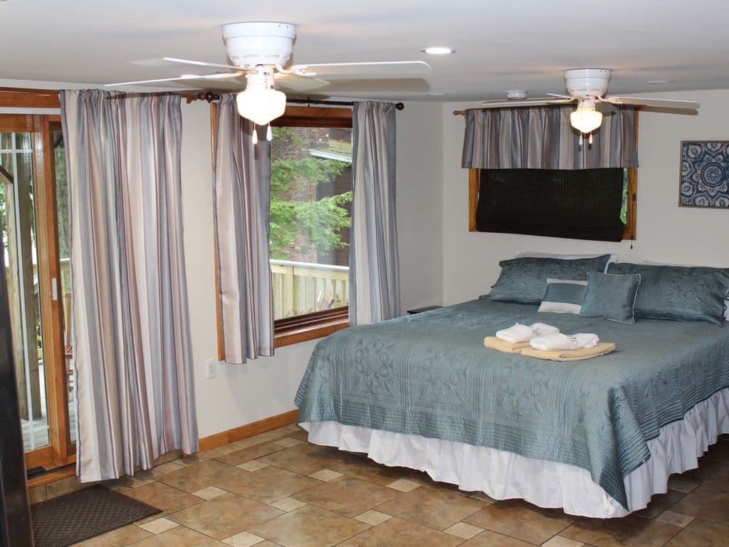 King Bedroom with deck overlooking the lake