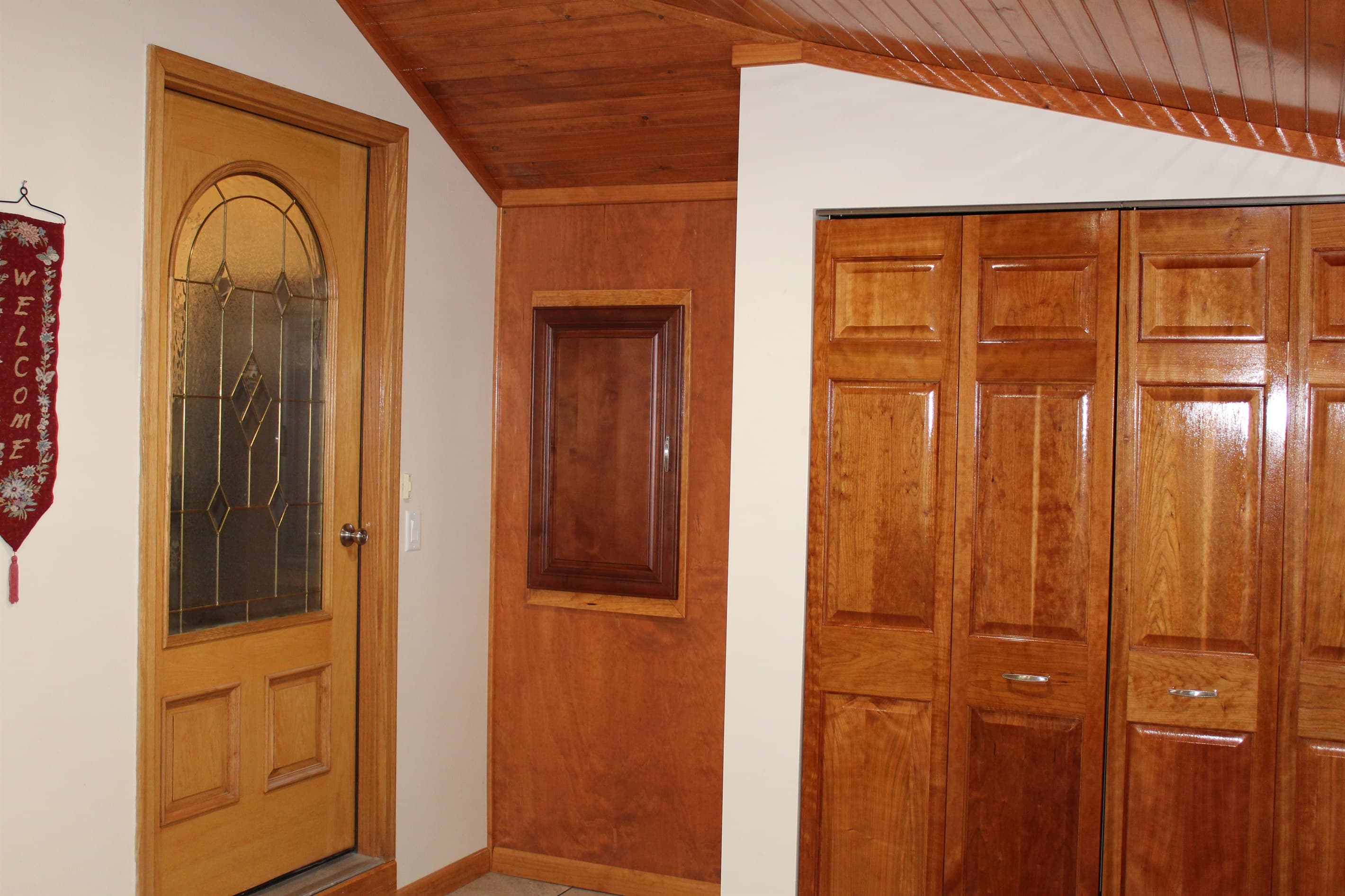 Large entryway with foyer closet