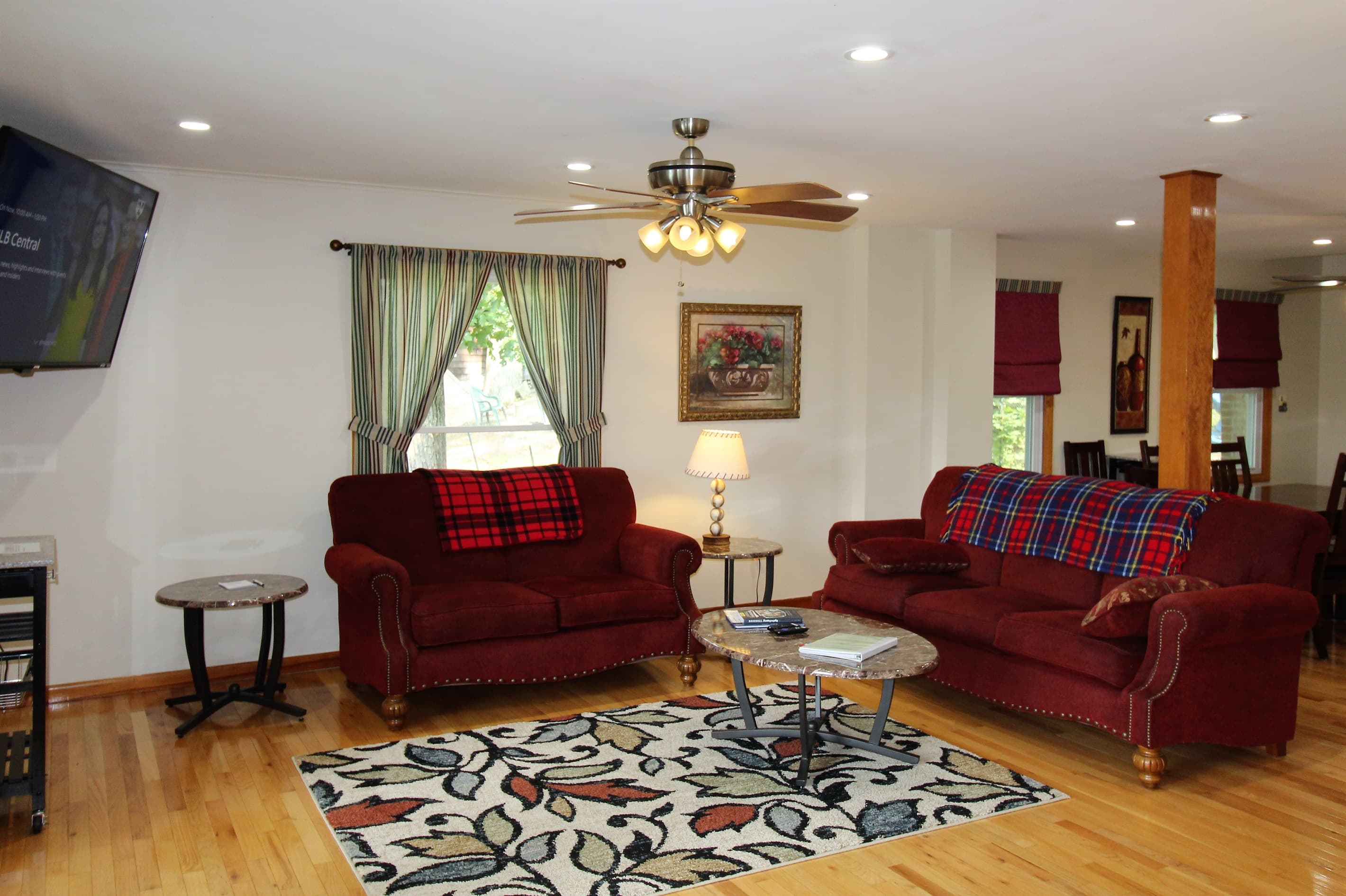 Living Room with large flat screen smart Roku TV