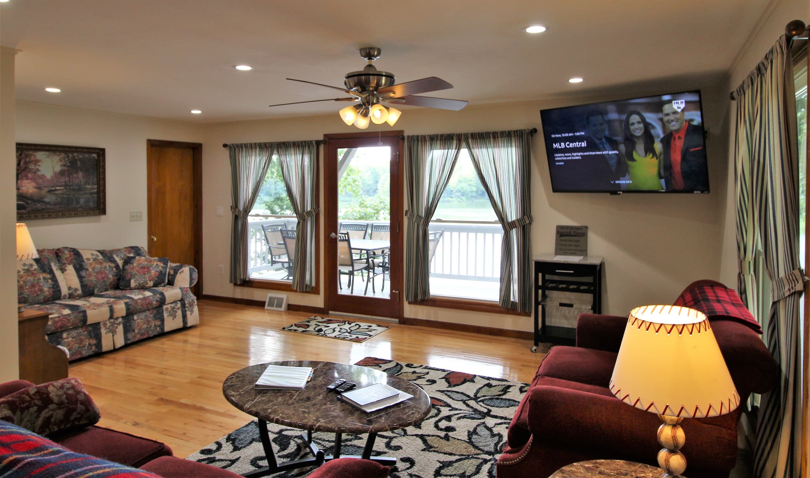 60" (or larger) flat screen smart TV with Roku.  Just bring your streaming apps and never miss your favorite game or shows